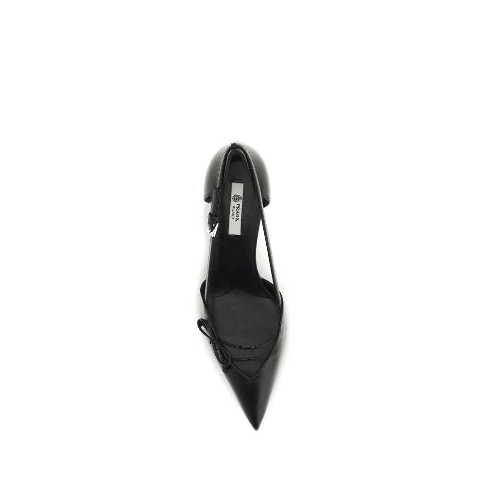 Indulge in the exquisite craftsmanship of Prada's Black Calf Leather Bos Taurus Mid Heel Pumps, where timeless elegance meets sophisticated allure for a refined lifestyle.