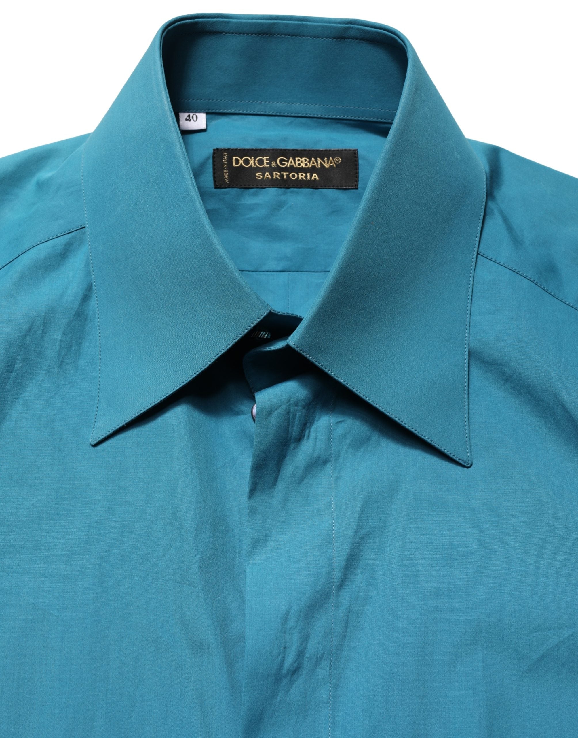 Elevate your wardrobe with the Dolce & Gabbana Blue SARTORIA Long Sleeve Cotton Dress Shirt, a masterpiece of Italian craftsmanship that embodies timeless luxury and sophistication.