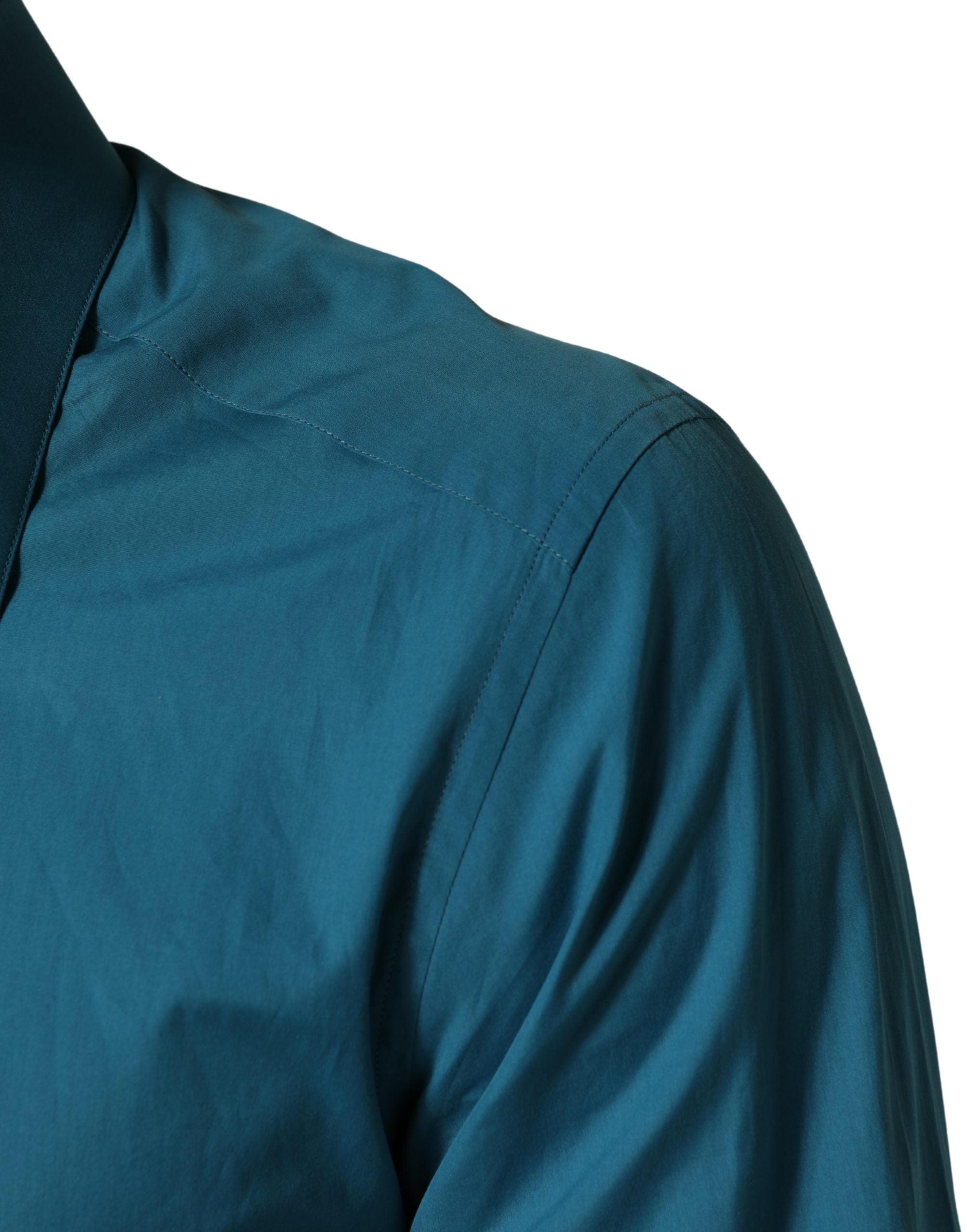 Elevate your wardrobe with the Dolce & Gabbana Blue SARTORIA Long Sleeve Cotton Dress Shirt, a testament to Italian craftsmanship and timeless sophistication.