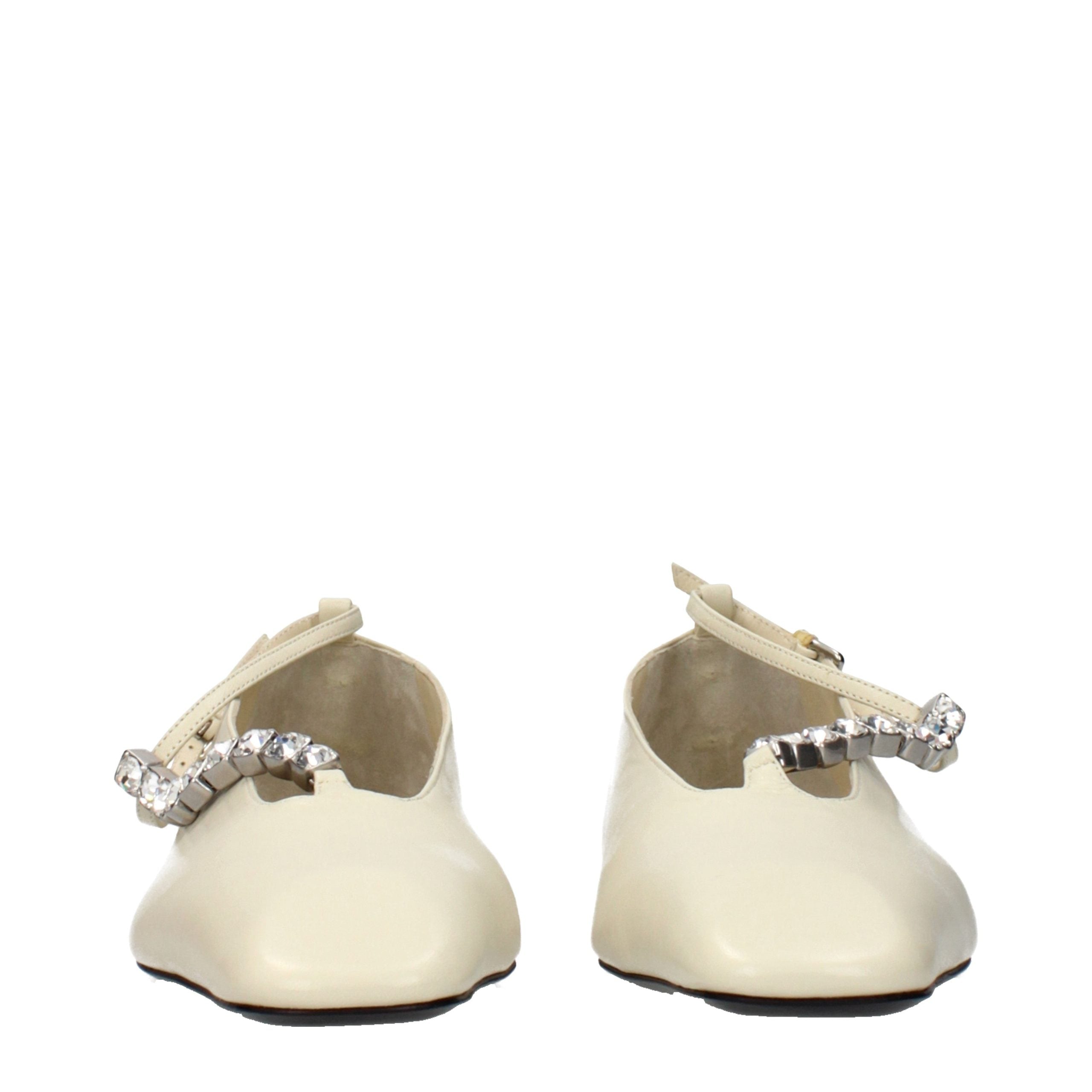 Step into a realm of sophistication with Jil Sander Beige Leather Ballet Flats, where exquisite craftsmanship meets timeless elegance, perfect for any occasion.