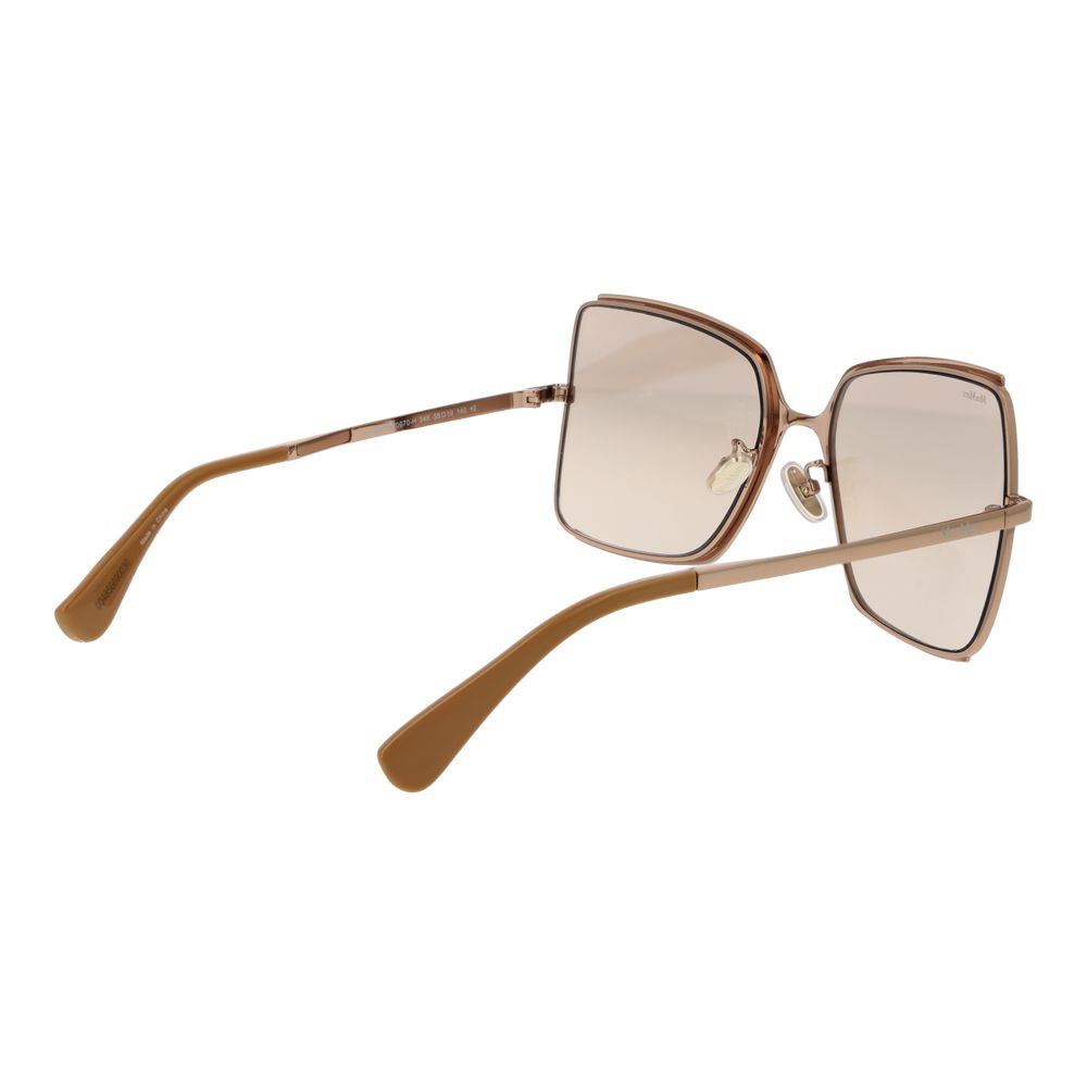 Indulge in the exquisite Max Mara Brown Metal Sunglasses, where luxurious design meets timeless elegance, perfect for the discerning individual seeking sophistication.