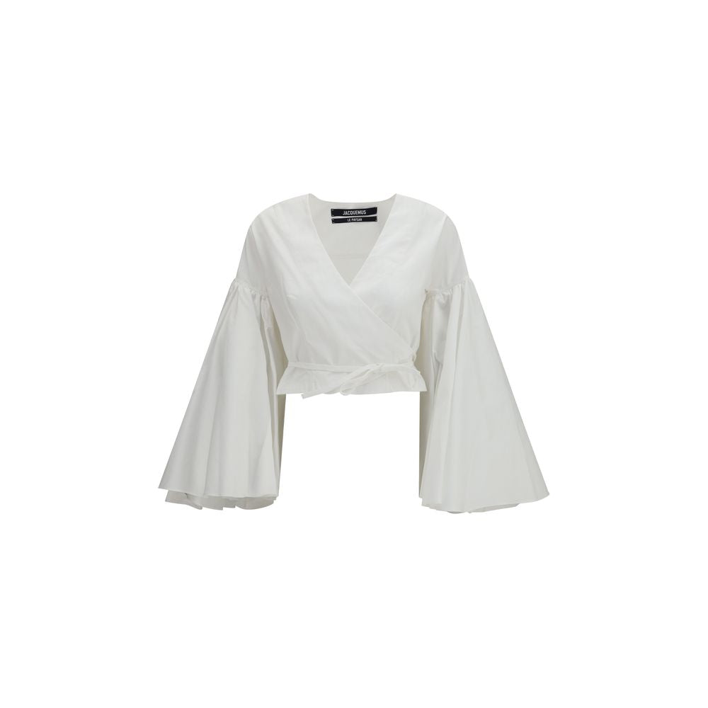 Indulge in the Jacquemus White Cotton Shirt from the SS26 collection, where exquisite craftsmanship meets luxurious cotton poplin, embodying timeless elegance for any occasion.