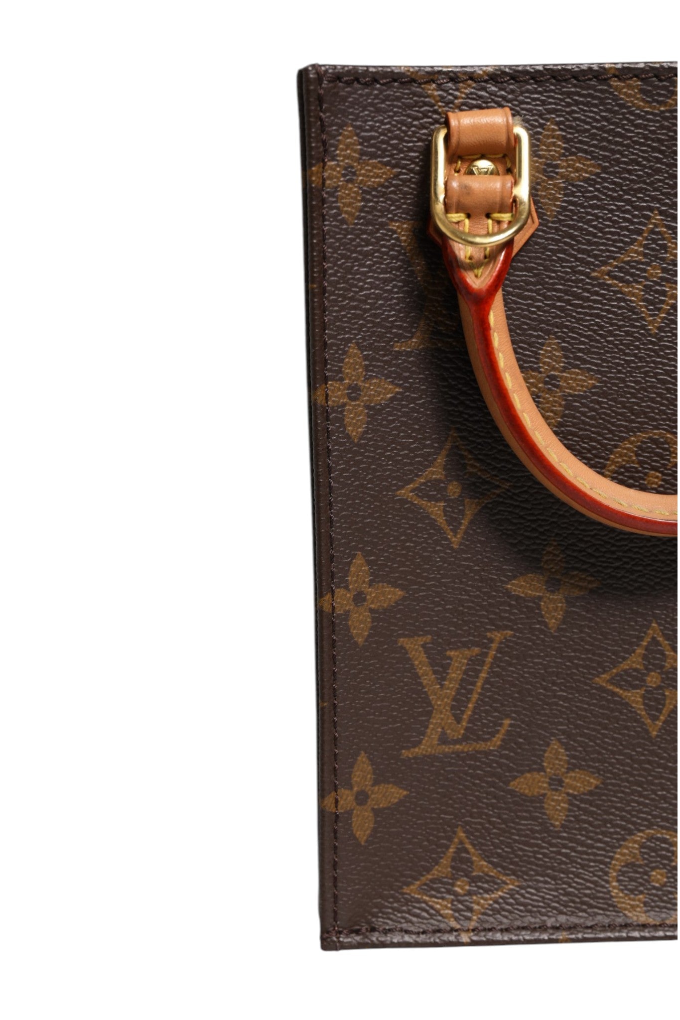Indulge in the exquisite craftsmanship of the Louis Vuitton Monogram Canvas Petit Sac Plat Bag, a timeless piece that embodies luxury and sophistication for any occasion.