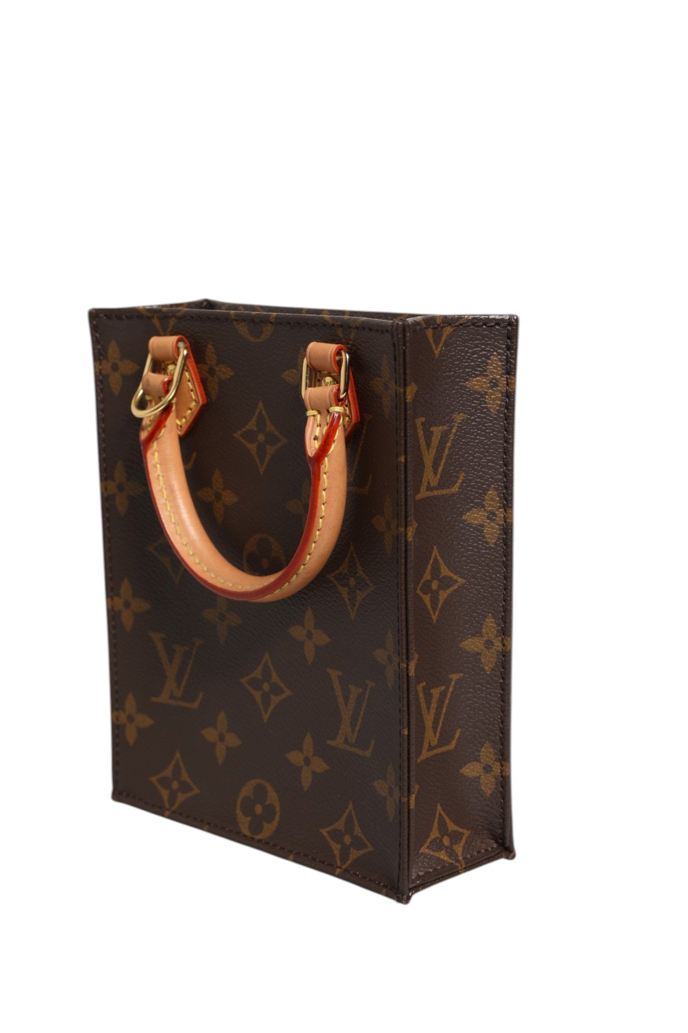 Indulge in the exquisite craftsmanship of the Louis Vuitton Monogram Canvas Petit Sac Plat Bag, a timeless accessory that embodies luxury and sophistication for any occasion.