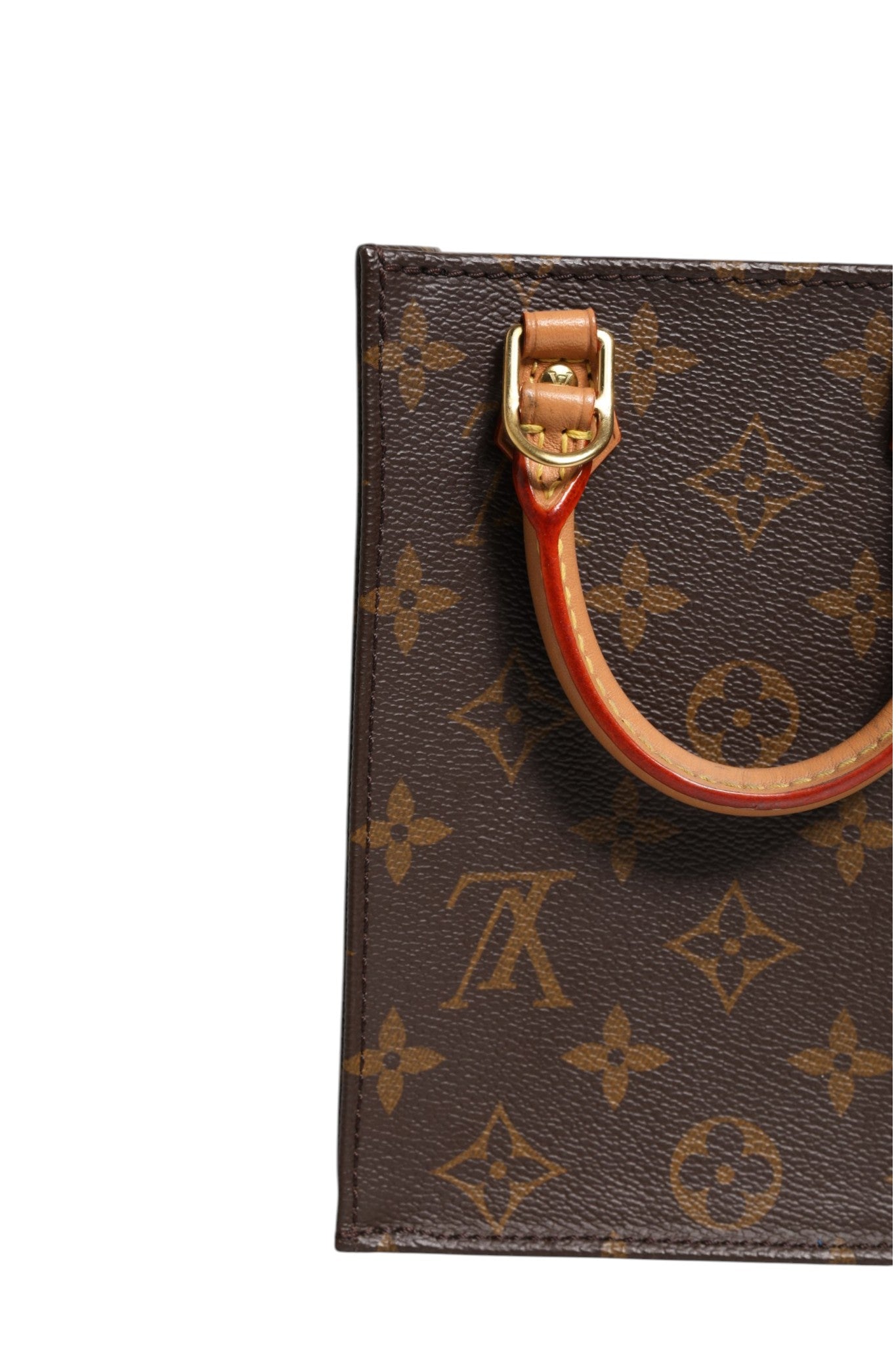 Elevate your style with the Louis Vuitton Monogram Canvas Petit Sac Plat Bag, a symbol of artisanal luxury and timeless elegance, perfect for any sophisticated occasion.