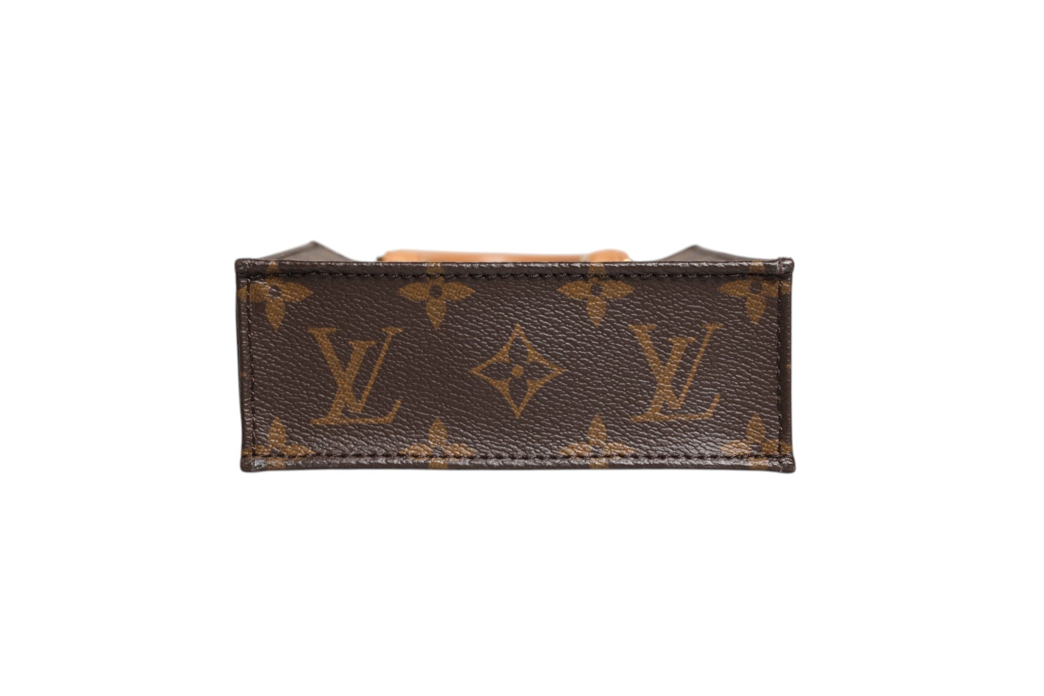 Discover the Louis Vuitton Monogram Canvas Petit Sac Plat Bag, a symbol of artisanal luxury and timeless elegance, perfect for those who appreciate exquisite craftsmanship.