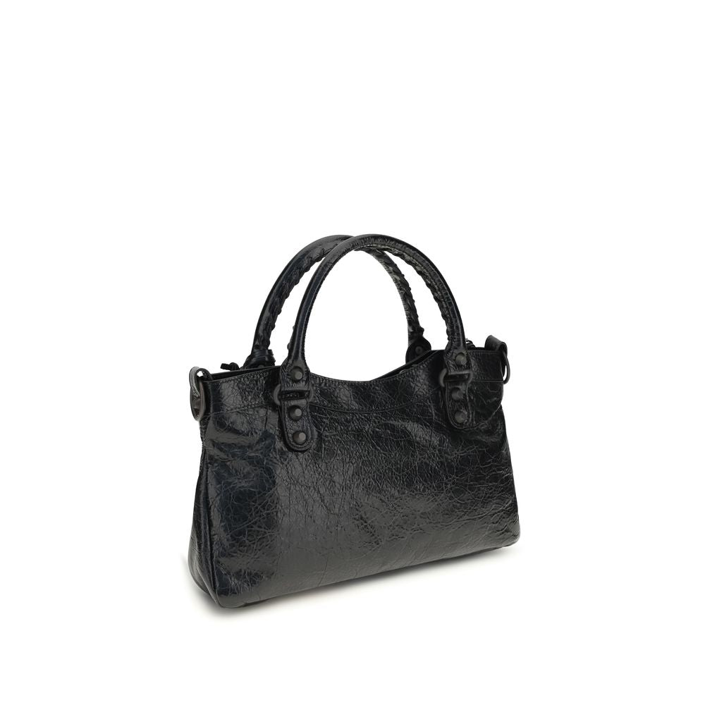 Indulge in the Balenciaga Black Lamb Ovis Aries Aries Shoulder Bag, where artisanal luxury meets sophisticated design, elevating your style to new heights.