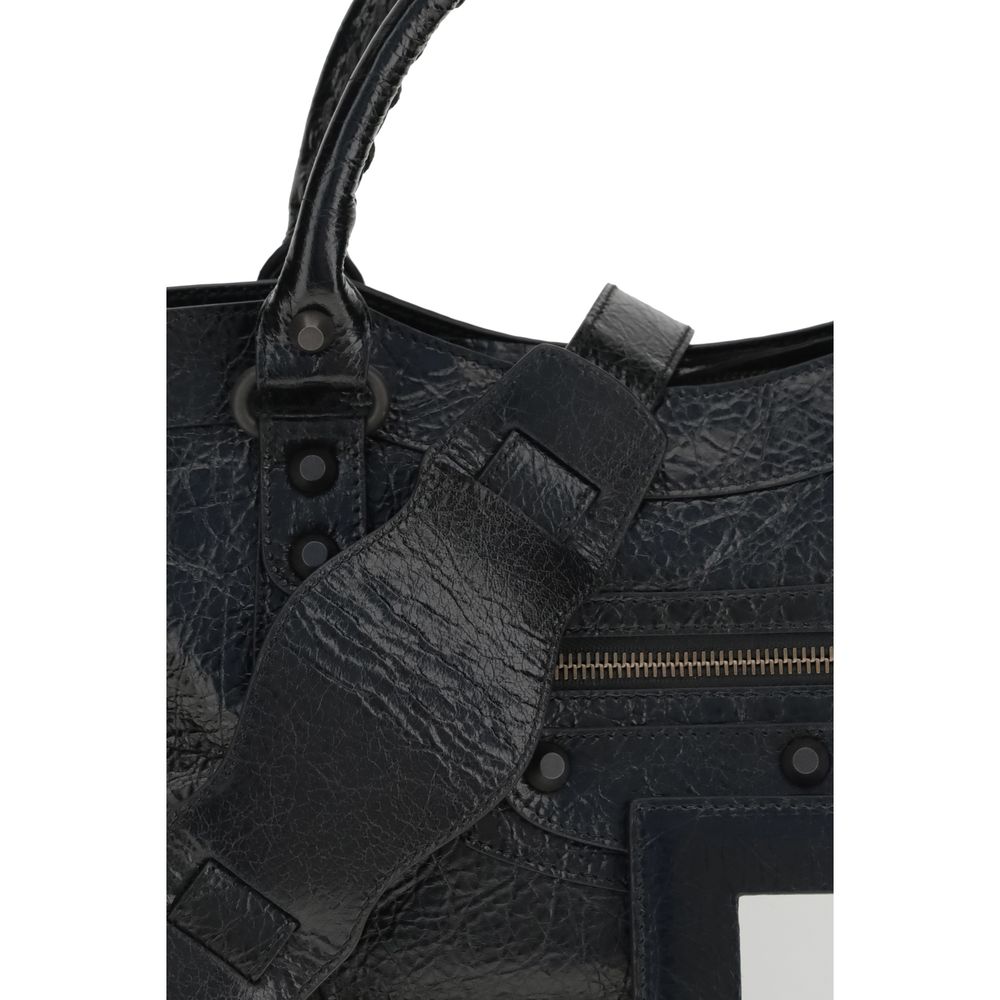 Discover the Balenciaga Black Lamb Ovis Aries Aries Shoulder Bag, a masterpiece of artisanal luxury, crafted from premium lamb leather for the discerning connoisseur.