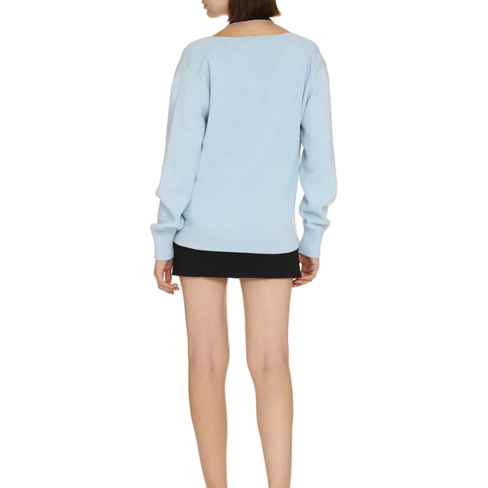 Elevate your wardrobe with the Fendi Blue Cashmere Cardigan, a masterpiece of Italian craftsmanship, blending luxury and sophistication for the discerning individual.