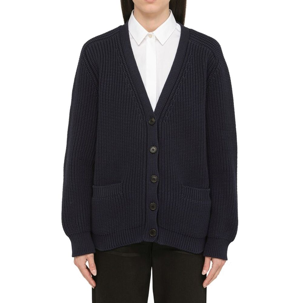 Elevate your wardrobe with the Prada Blue Cotton Cardigan, a timeless piece crafted from 100% cotton, embodying sophistication and effortless elegance for every occasion.