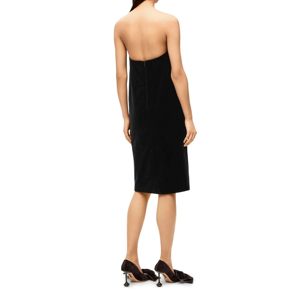 Discover the Loewe Black Cotton Cocktail Dress, a masterpiece of Italian craftsmanship blending luxury and elegance, perfect for those who embody sophistication and allure.
