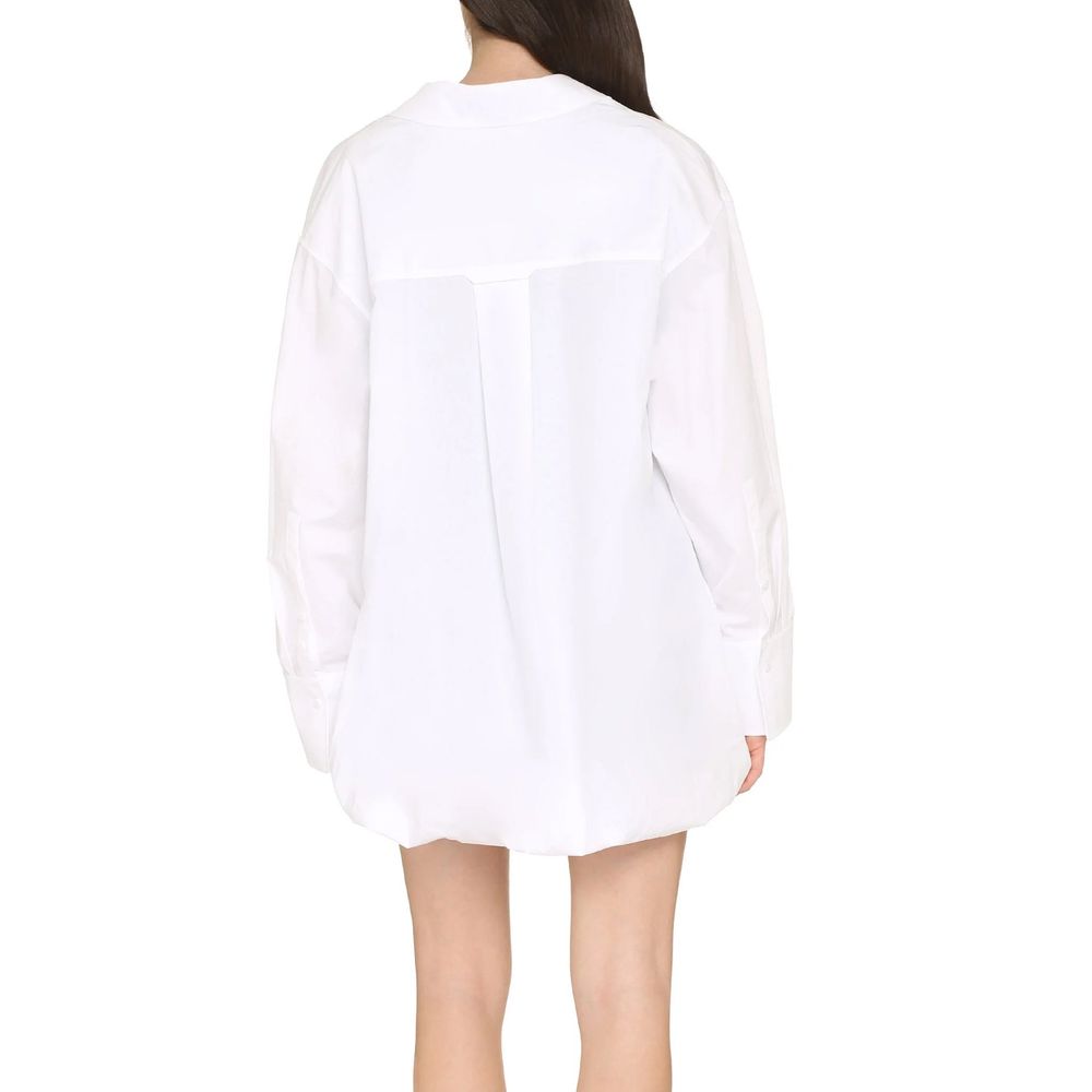 Discover the Valentino White Cotton Casual Dress, a masterpiece of Italian craftsmanship, blending elegance and comfort for sophisticated moments.