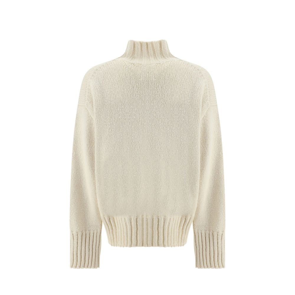 Experience the exquisite allure of the Jil Sander White Silk Sweatshirt, where luxurious silk and wool blend in a timeless design, embodying Italian elegance and refined craftsmanship.