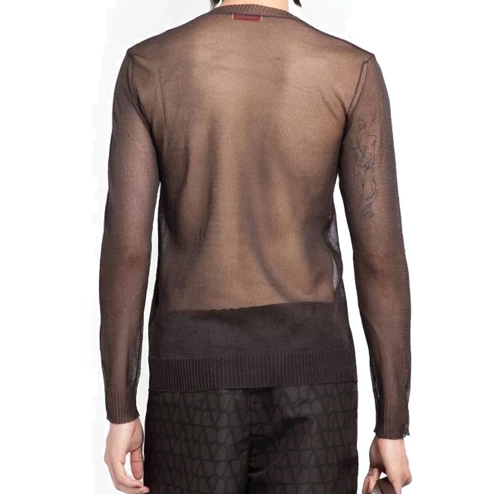 Indulge in the Valentino Brown Silk Sweatshirt, a masterpiece of Italian craftsmanship in 100% silk, exuding timeless elegance and sophisticated allure for discerning individuals.