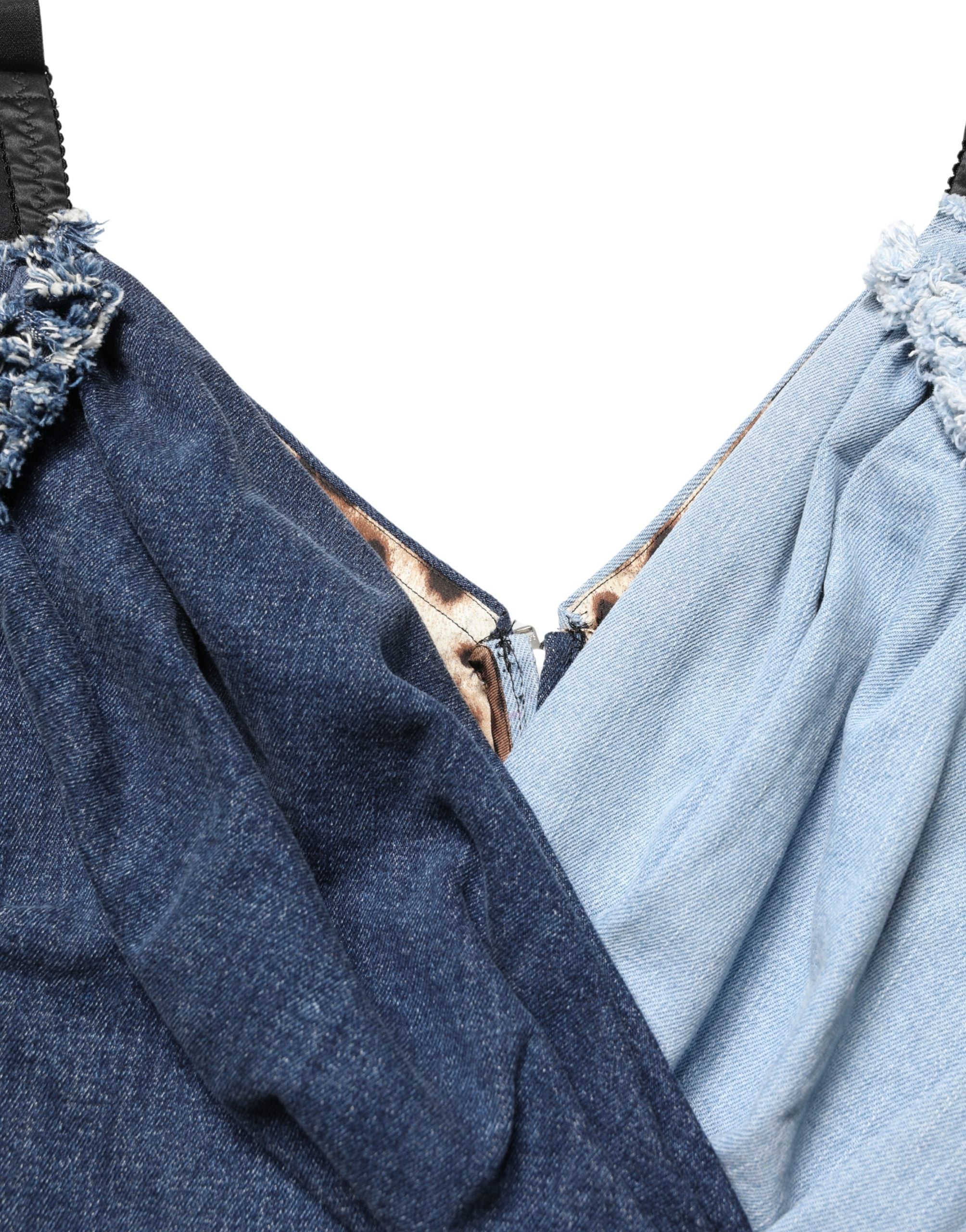 Elevate your wardrobe with the Dolce & Gabbana Blue Cotton Patchwork Denim Mini Sheath Dress, a masterpiece of Italian craftsmanship that embodies luxury and sophistication.