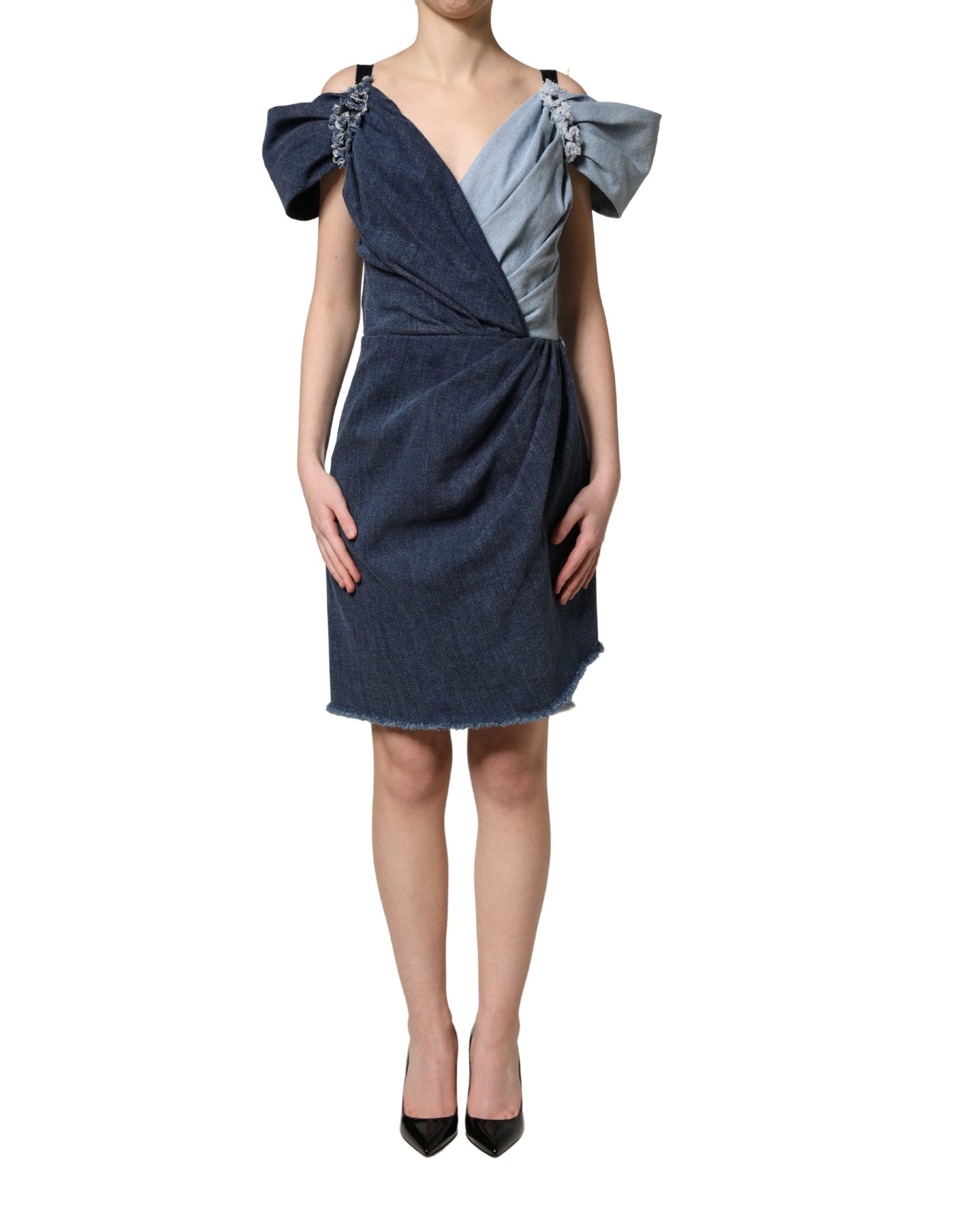 Indulge in the allure of the Dolce & Gabbana Blue Cotton Patchwork Denim Mini Sheath Dress, where exquisite craftsmanship meets timeless elegance, perfect for any sophisticated occasion.