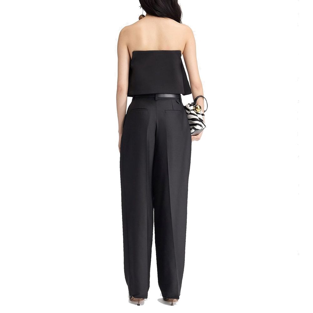 Experience the exquisite allure of Jacquemus Black Silk Flared Pants, a masterful blend of silk and virgin wool, embodying timeless elegance and sophistication.