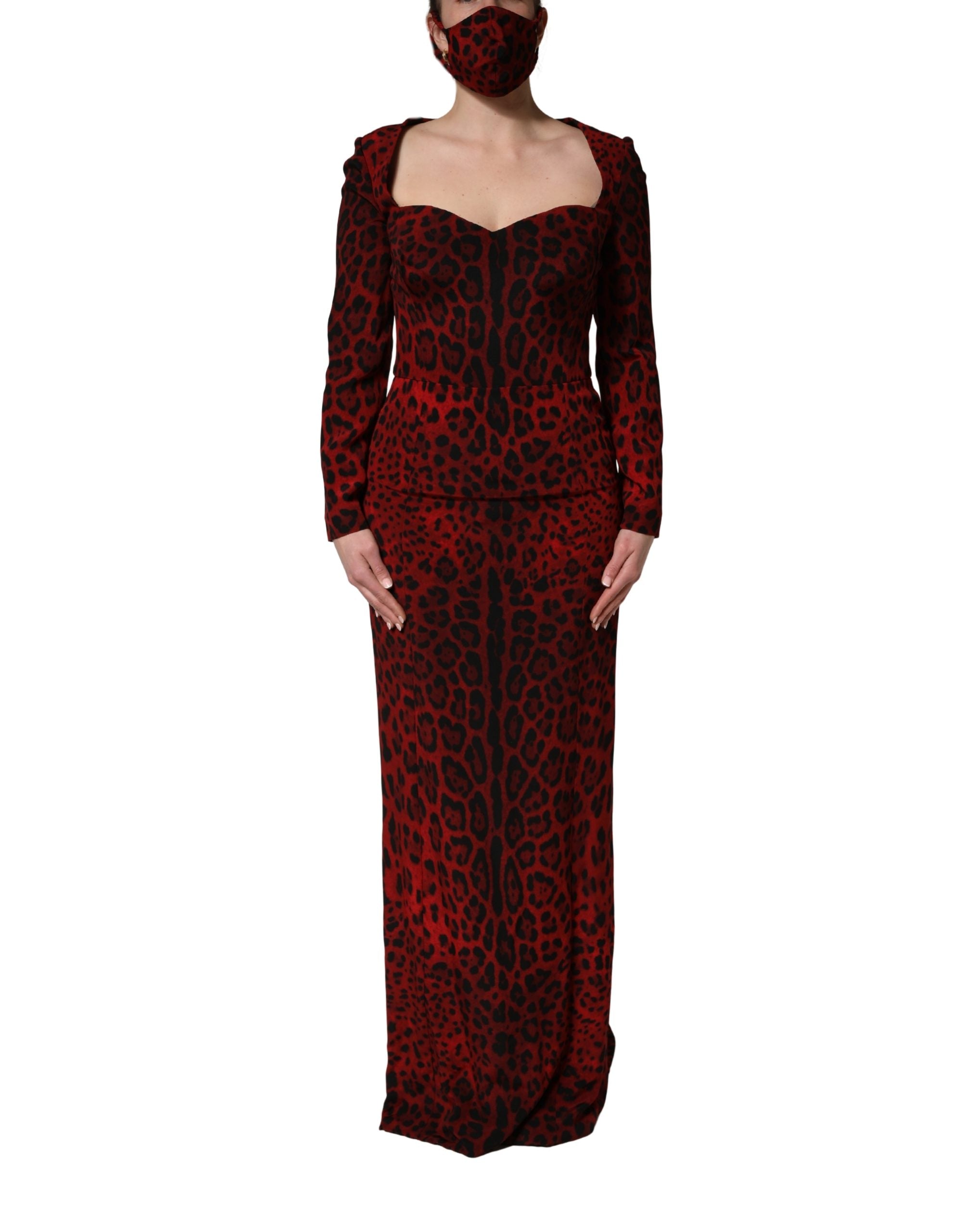 Indulge in the exquisite allure of the Dolce & Gabbana red leopard print sheath dress, a luxurious silk masterpiece that embodies sophistication and timeless elegance.
