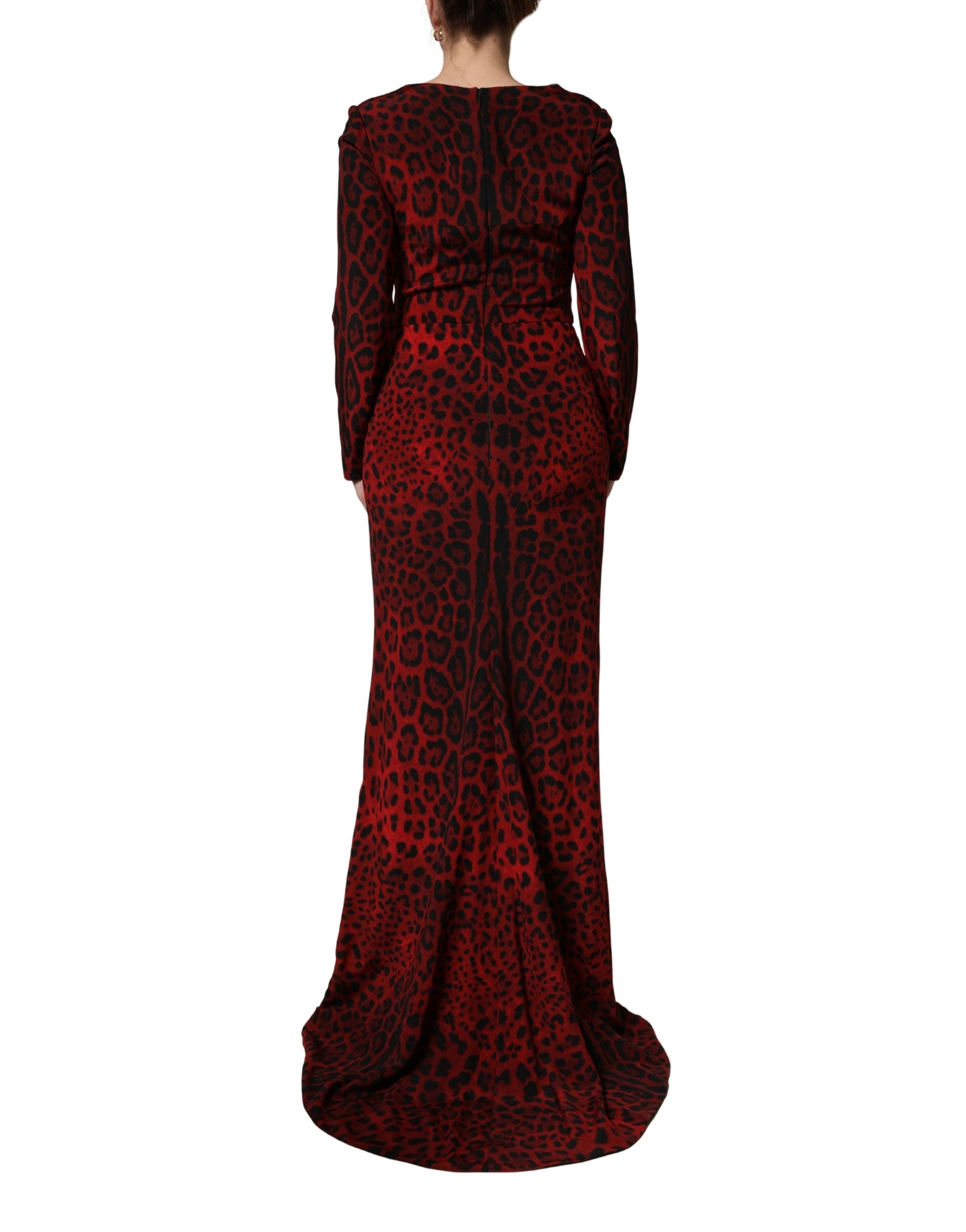 Indulge in the allure of the Dolce & Gabbana red leopard print sheath dress, a masterpiece of silk that embodies sophistication and timeless elegance for unforgettable moments.