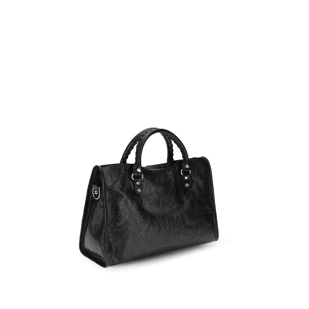 Indulge in the Balenciaga Black Lamb Ovis Aries Aries Shoulder Bag, a timeless luxury crafted from premium lambskin, merging exquisite design with unparalleled sophistication.