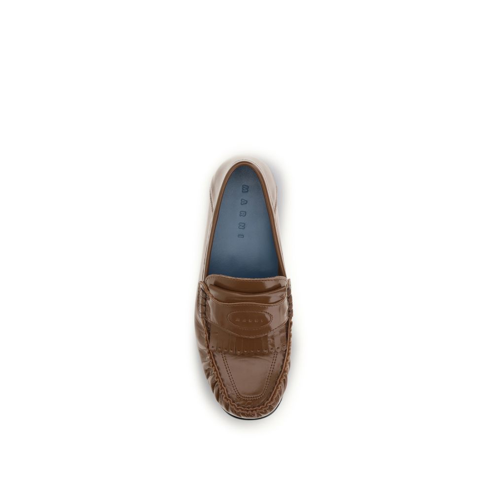 Discover the Marni Brown Lamb Ovis Aries Slip-On Loafers, where exquisite craftsmanship meets luxurious comfort, elevating your style for every occasion.