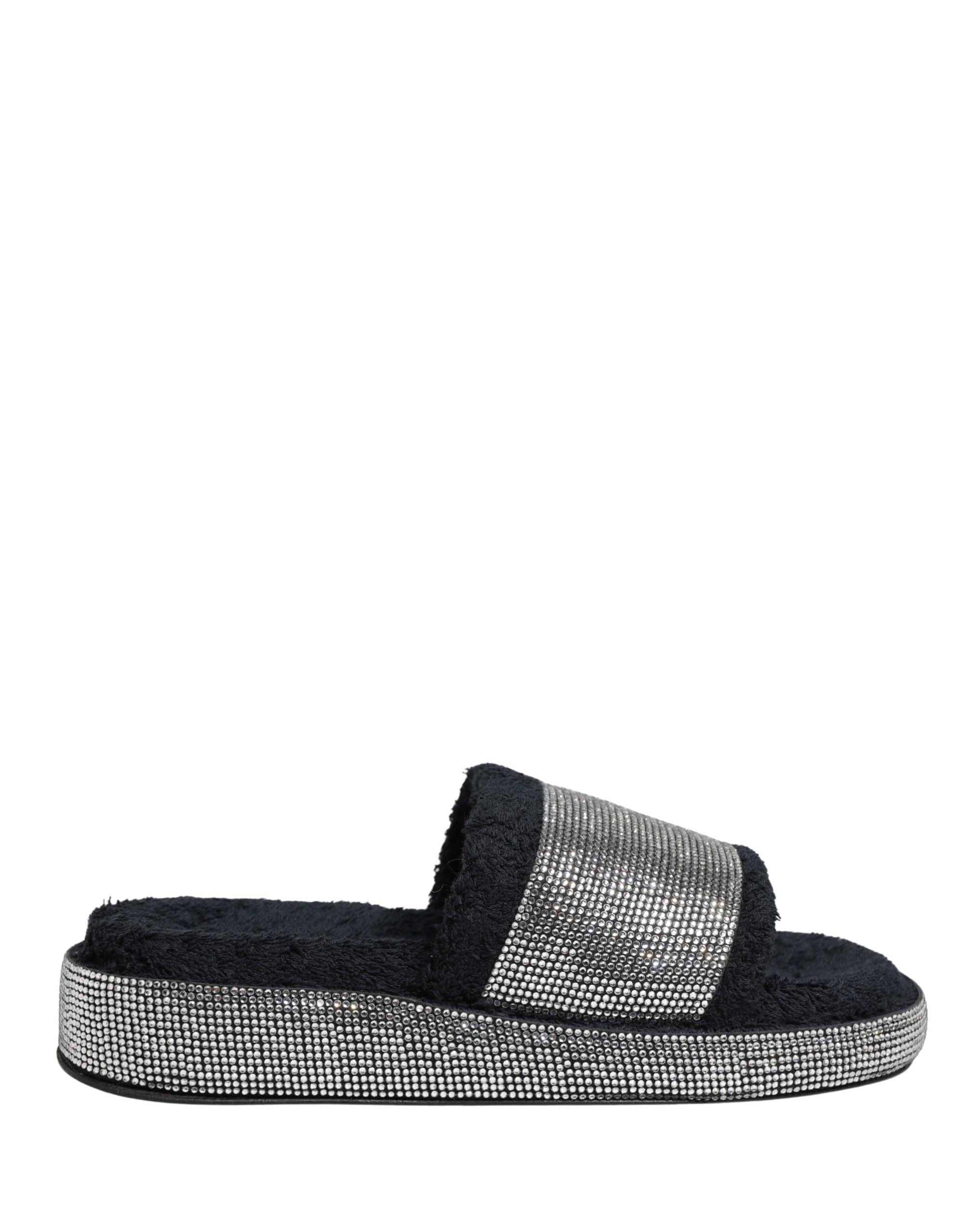 Experience the allure of Dolce & Gabbana's black crystal-embellished platform slides, where exquisite craftsmanship meets luxurious comfort, perfect for the discerning individual.