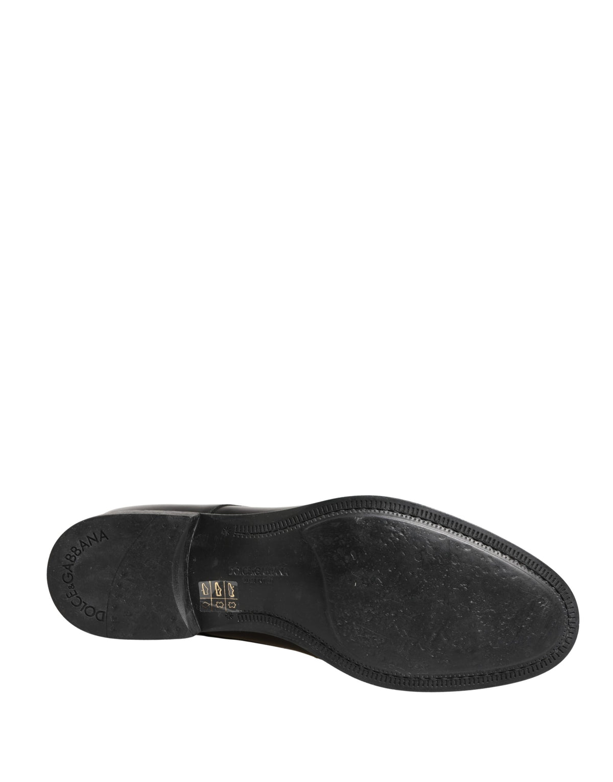 Indulge in the exquisite craftsmanship of Dolce & Gabbana's Black Calfskin Leather Derby Shoes, where timeless elegance meets modern sophistication for the discerning individual.