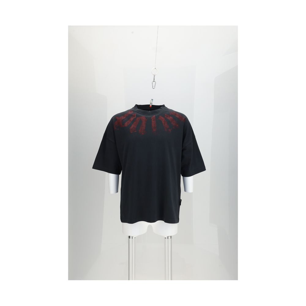 Discover the Palm Angels Black Cotton T-Shirt, a luxurious blend of comfort and style, featuring a distressed logo for a statement of refined elegance.