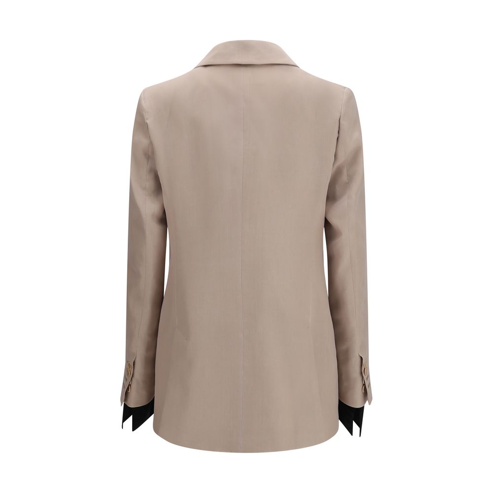 Discover the Max Mara Feltro Silk Blazer, a masterpiece of 100% silk craftsmanship, blending modern elegance with timeless sophistication for the discerning individual.
