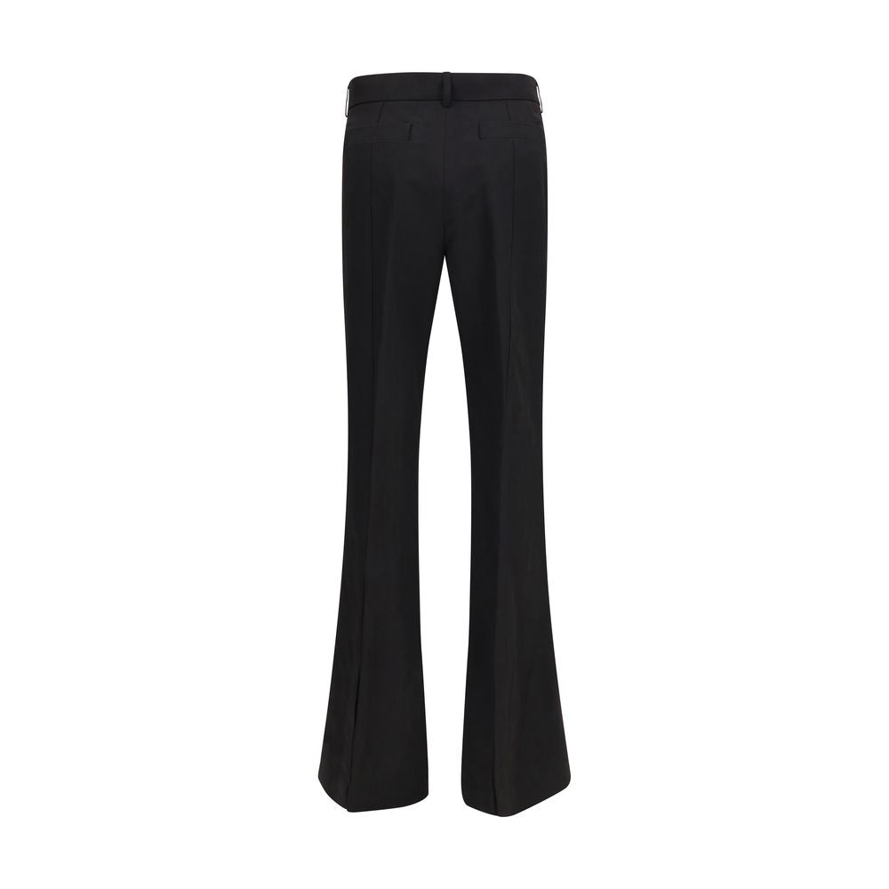 Indulge in the Max Mara Black Viscose Flared Pants, a timeless piece from SS26 that embodies elegance and modern artistry, crafted for the discerning fashion connoisseur.