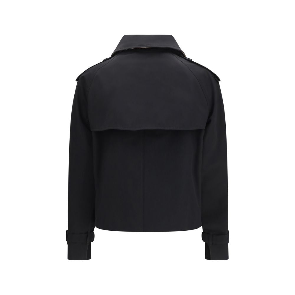 Discover the Burberry Black Cotton Trench Coat, a luxurious blend of rain-resistant gabardine and timeless elegance, perfect for the discerning individual.