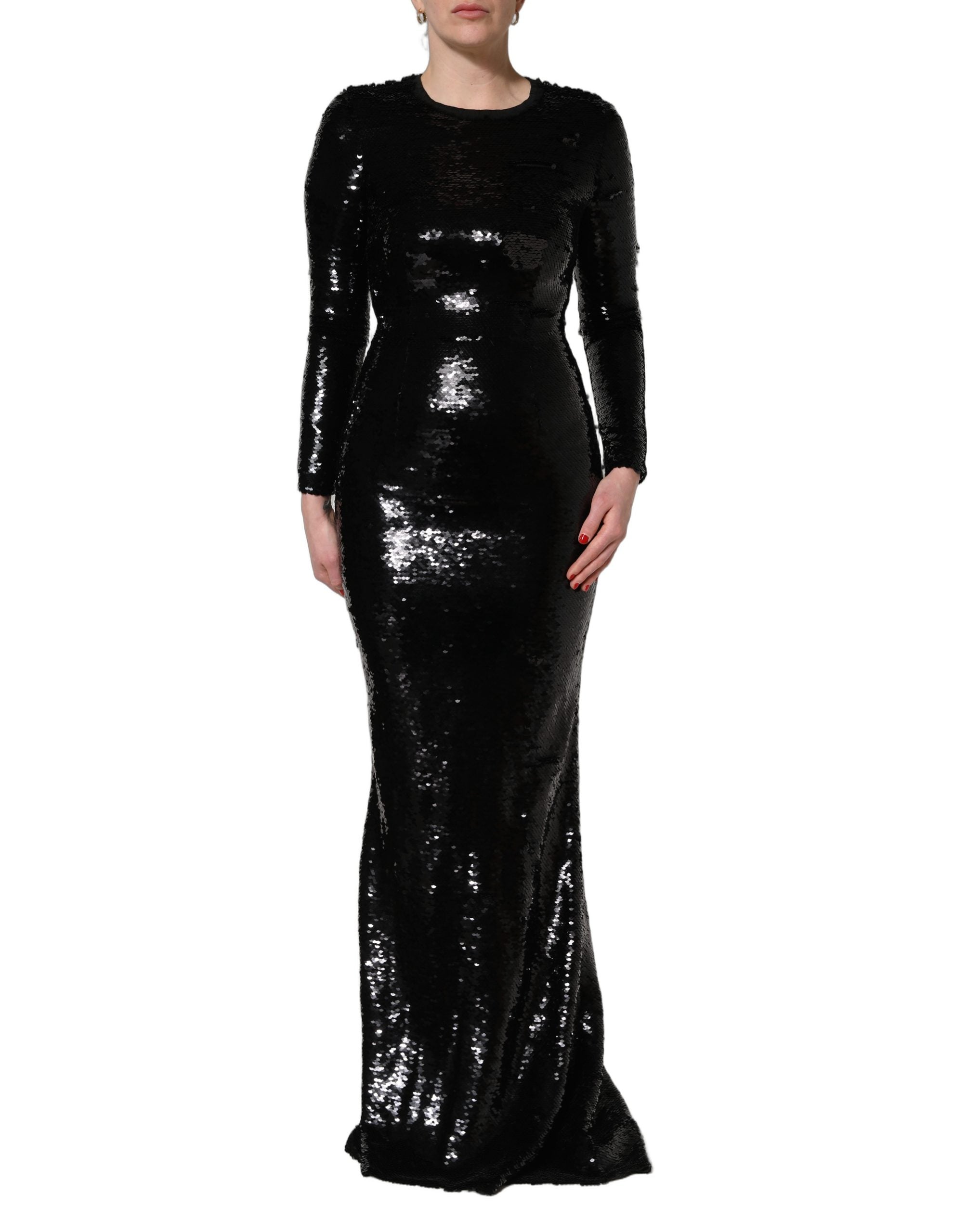 Elevate your evening elegance with the Dolce & Gabbana black bodycon mermaid sequinned gown, a masterpiece of opulence and exquisite craftsmanship, perfect for unforgettable moments.