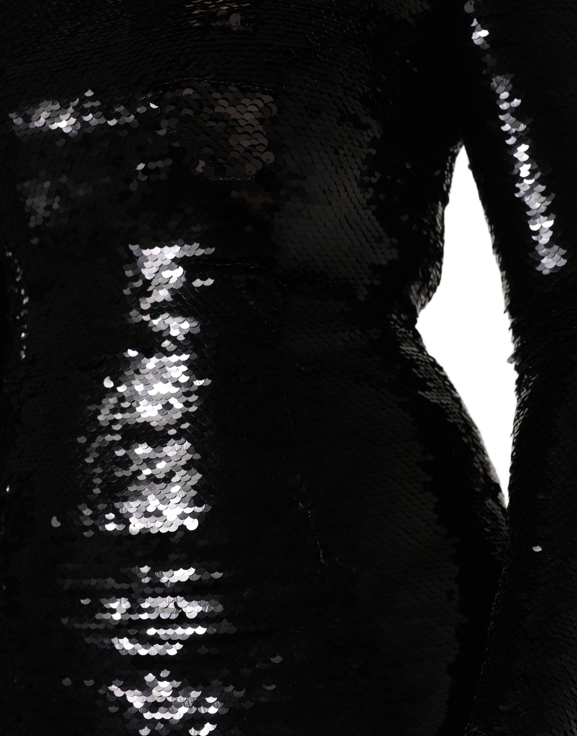 Experience the allure of the Dolce & Gabbana Black Bodycon Mermaid Sequinned Gown, a symbol of opulence and exquisite craftsmanship, perfect for unforgettable evenings.