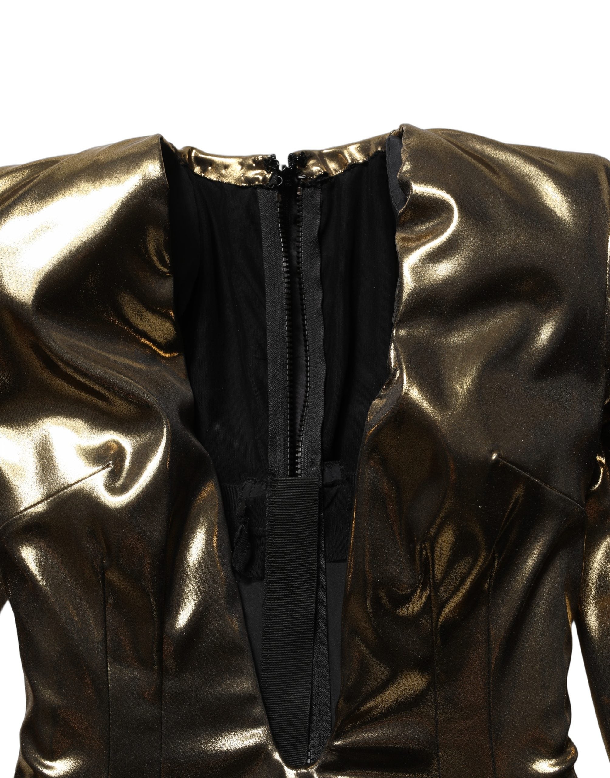 Experience the allure of the Dolce & Gabbana Gold Plunging Neckline Sheath Mini Dress, a masterpiece of Italian craftsmanship that embodies opulence and sophistication.
