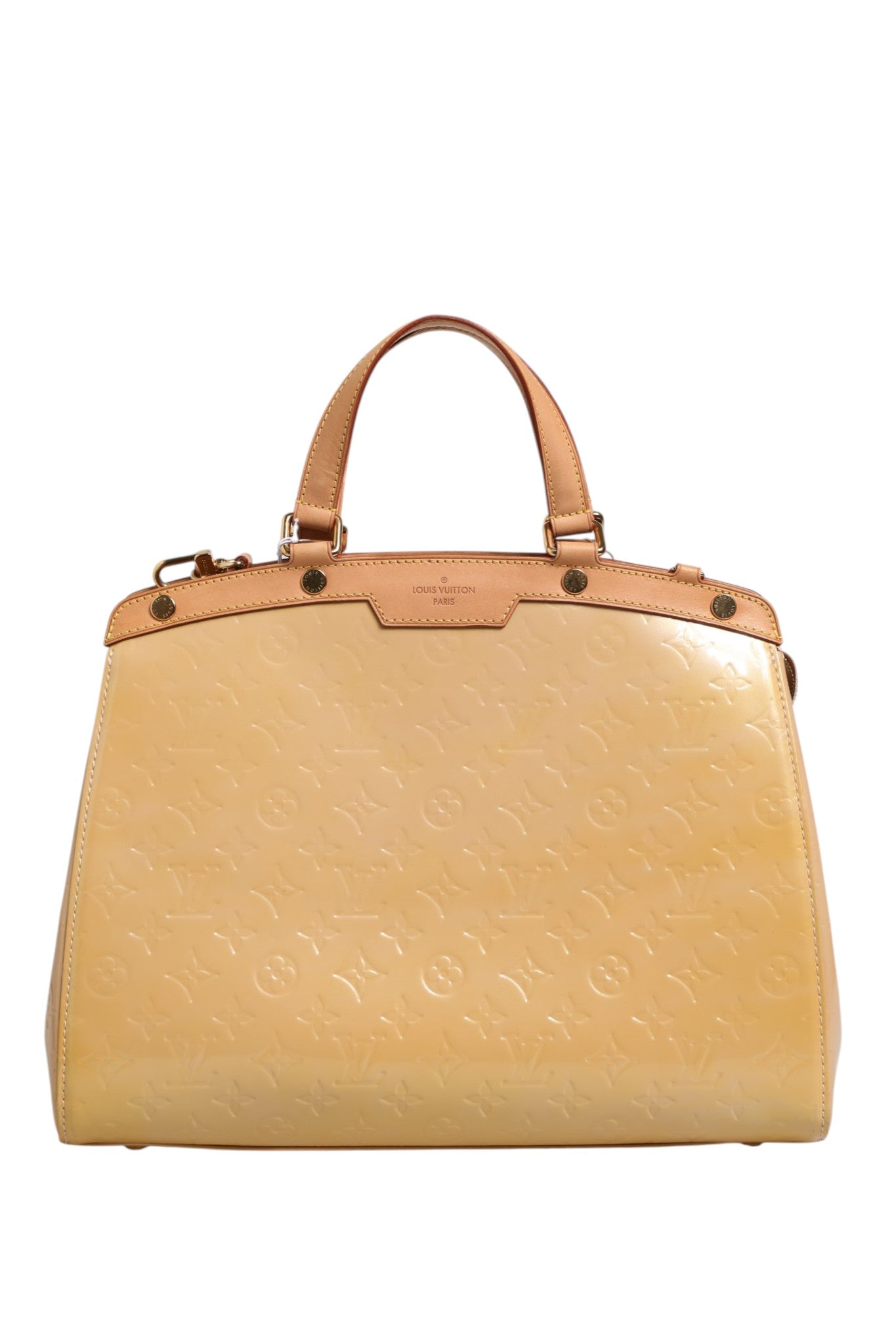 Indulge in the timeless elegance of the Louis Vuitton Monogram Vernis Brea MM, where exquisite craftsmanship meets luxurious design, perfect for every sophisticated moment.