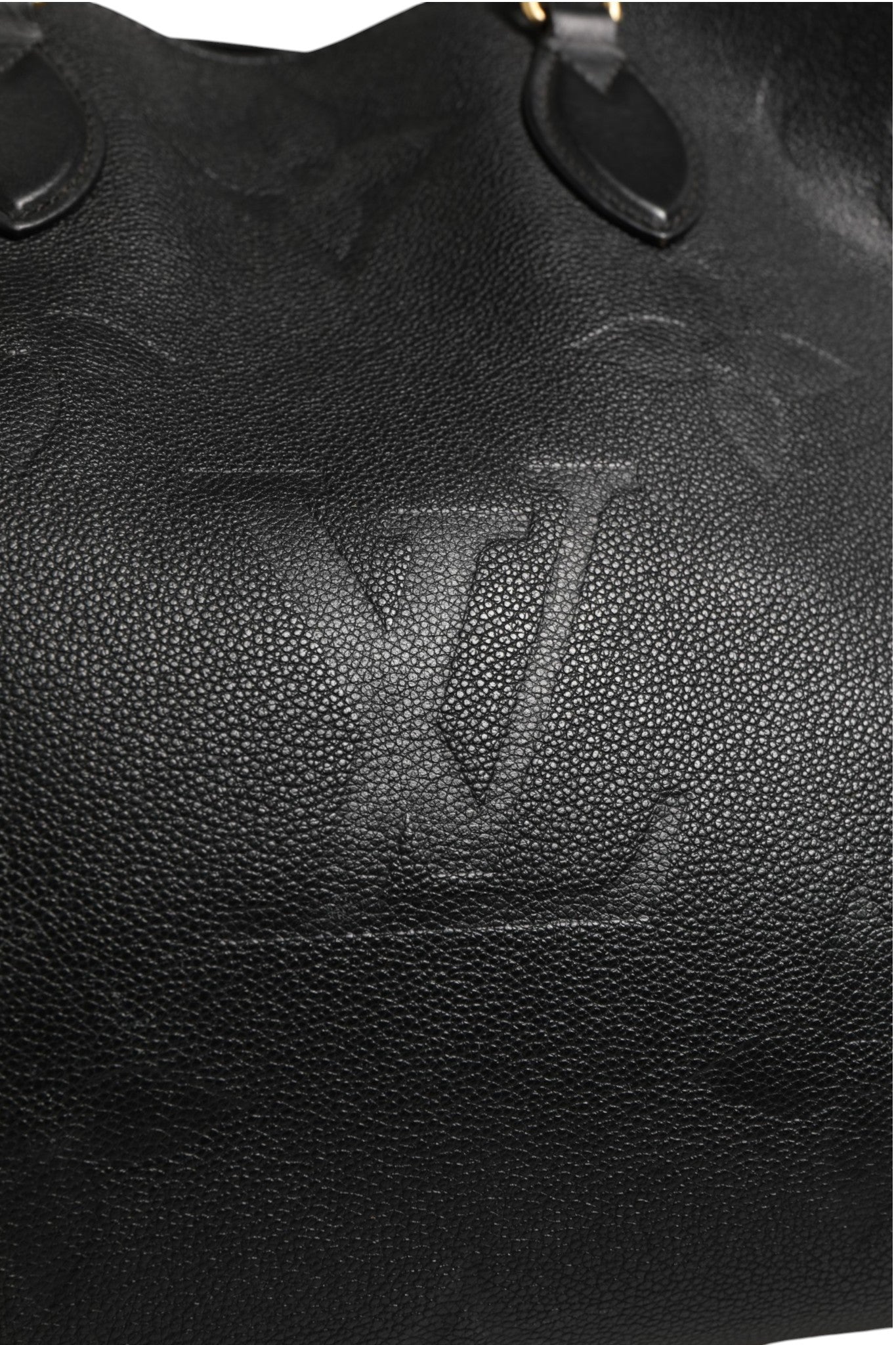 Indulge in the allure of the Louis Vuitton OnTheGo GM Monogram Empreinte Leather handbag, where exquisite craftsmanship meets timeless elegance, perfect for the discerning individual.