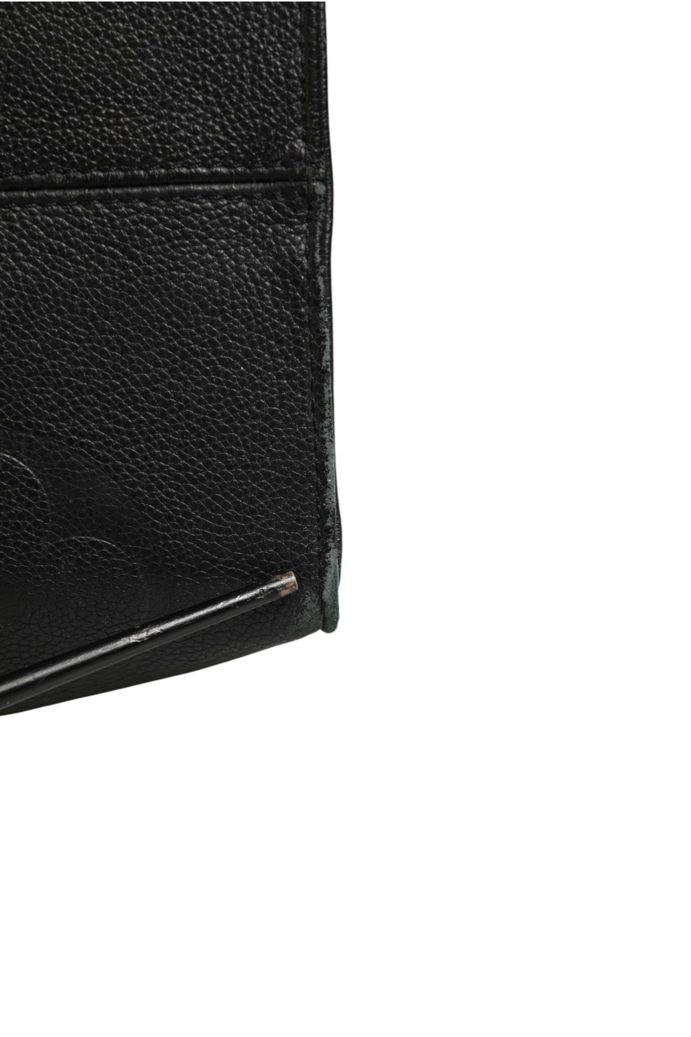 Discover the Louis Vuitton OnTheGo GM Monogram Empreinte Leather handbag, a timeless symbol of elegance and sophistication, perfect for the discerning individual.
