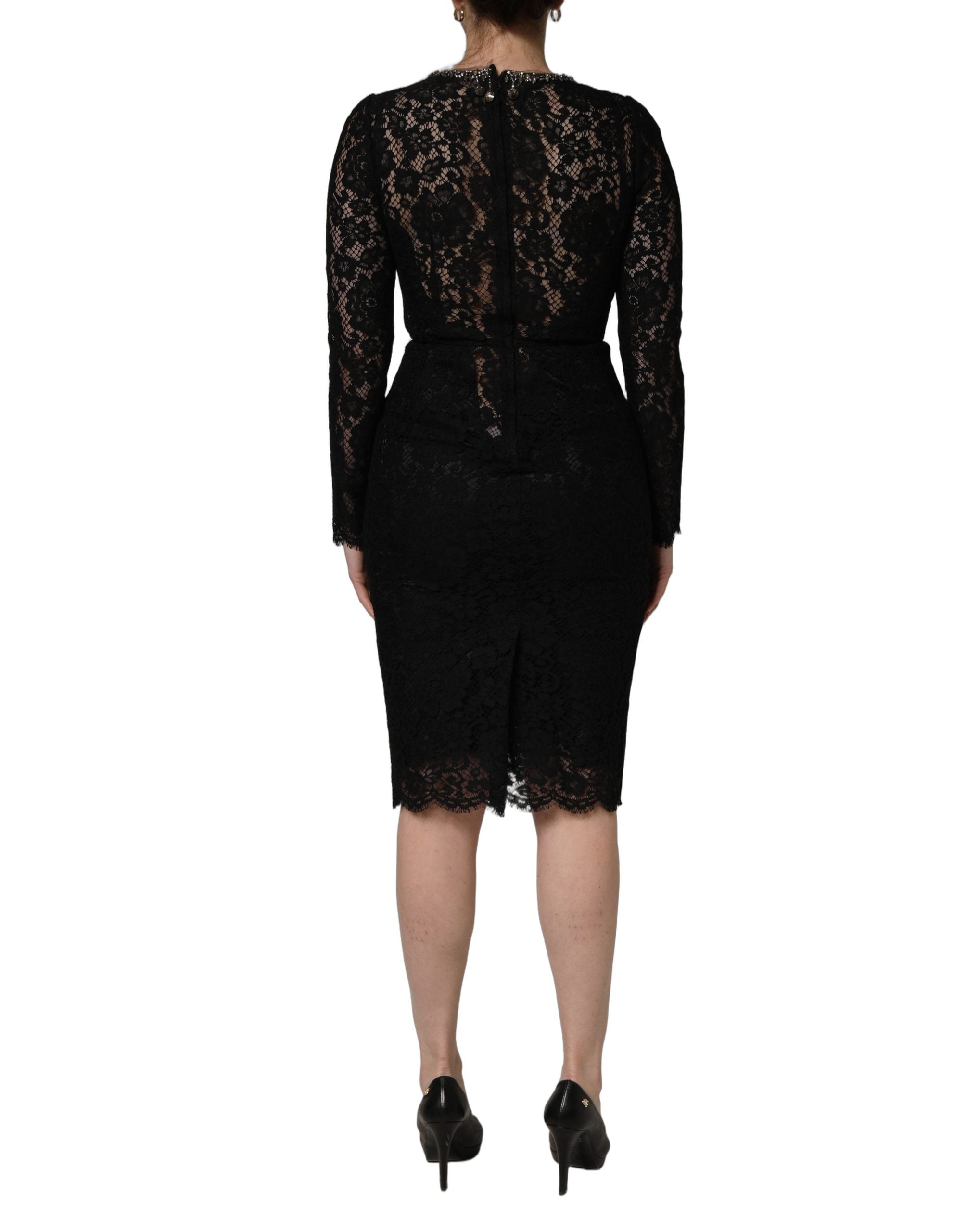 Indulge in the exquisite allure of the Dolce & Gabbana Black Crystal Embellished Sheath Midi Dress, a masterpiece of Italian craftsmanship that embodies timeless elegance and luxurious sophistication.