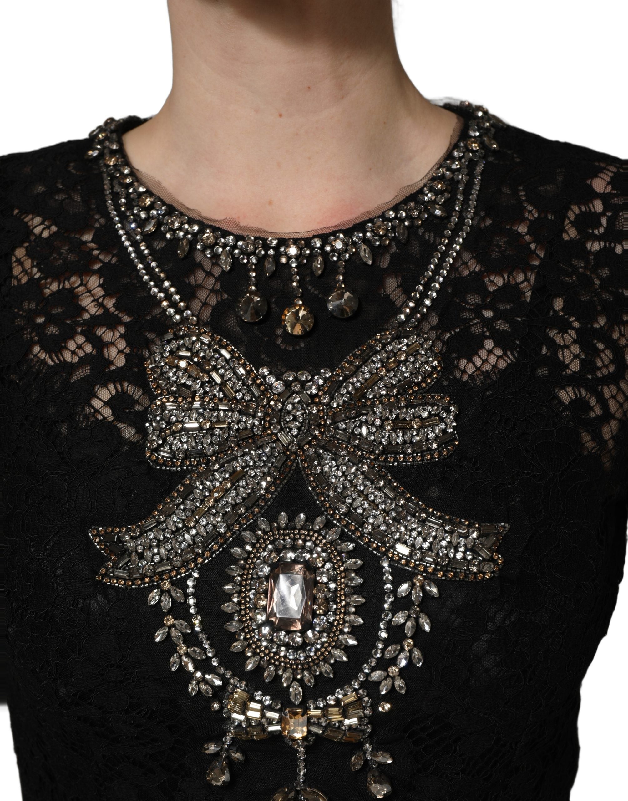 Elevate your elegance with the Dolce & Gabbana Black Crystal Embellished Sheath Midi Dress, a masterpiece of Italian craftsmanship that embodies timeless luxury and sophistication.