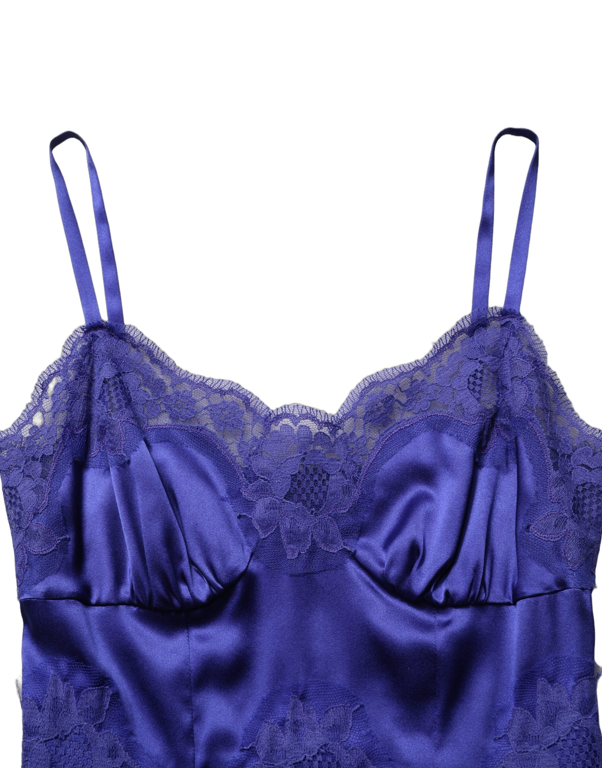 Embrace the allure of the Dolce & Gabbana Blue Sleeveless Lace Trim A-line Gown, where exquisite silk meets delicate lace, embodying timeless elegance for any sophisticated affair.