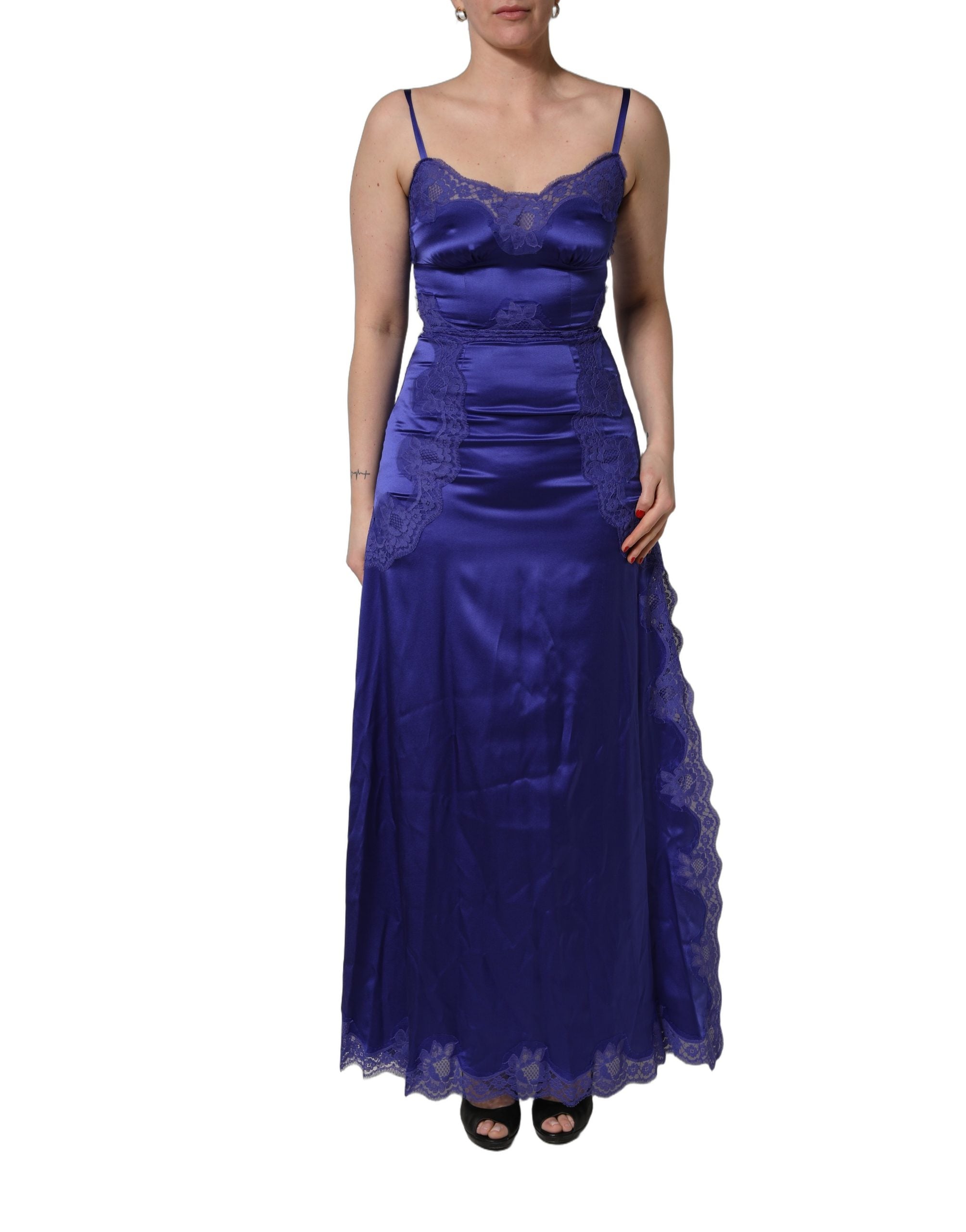 Indulge in the exquisite Dolce & Gabbana Blue Sleeveless Lace Trim A-line Gown, a timeless masterpiece of silk and lace, epitomizing luxury and elegance for every occasion.