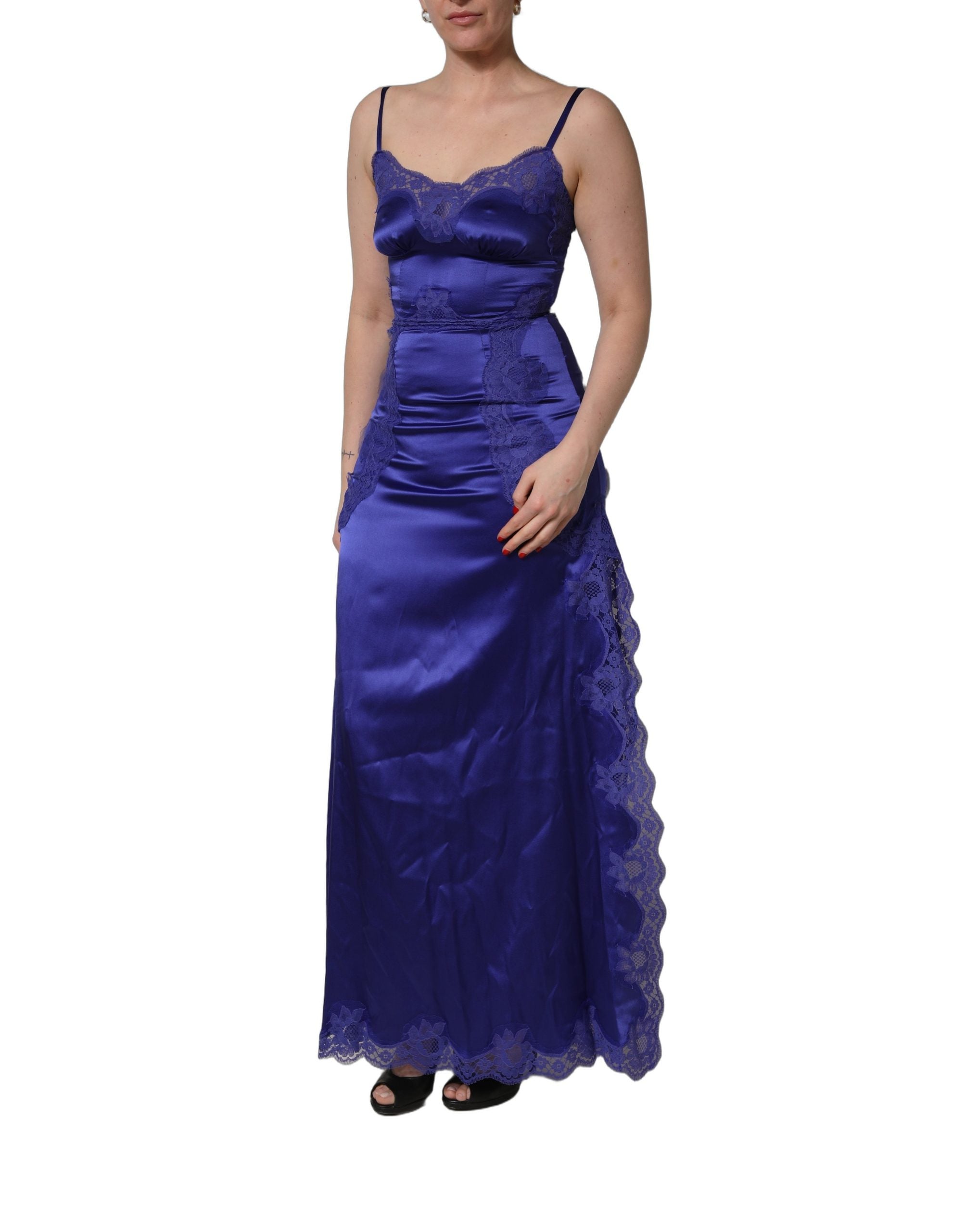 Indulge in the exquisite allure of the Dolce & Gabbana Blue Sleeveless Lace Trim A-line Gown, a masterpiece of silk and lace that embodies timeless elegance and sophistication.
