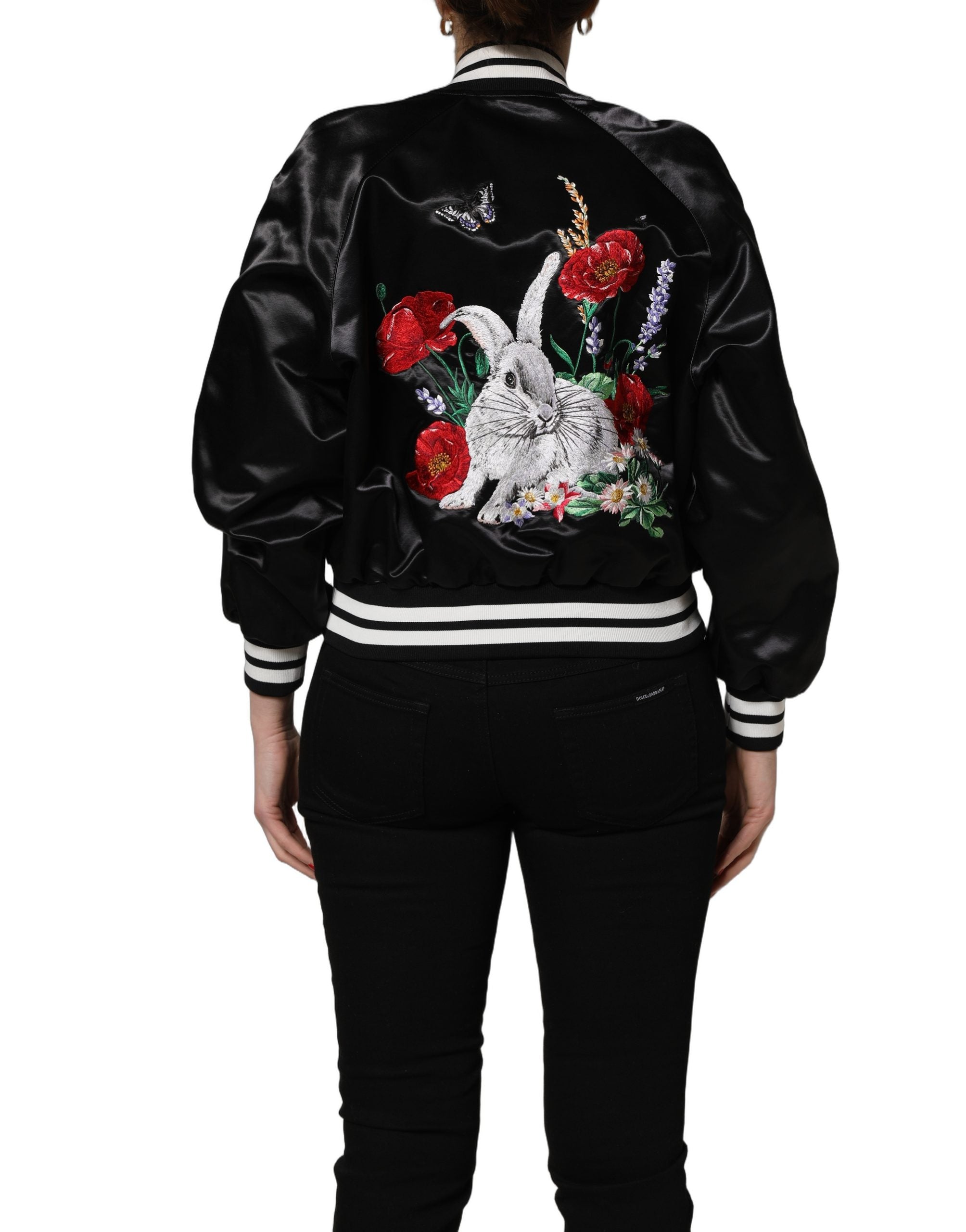 Discover the Dolce & Gabbana Black Satin Floral Embroidery Bomber Jacket, a masterpiece of Italian craftsmanship that elevates your style with luxurious elegance and timeless allure.