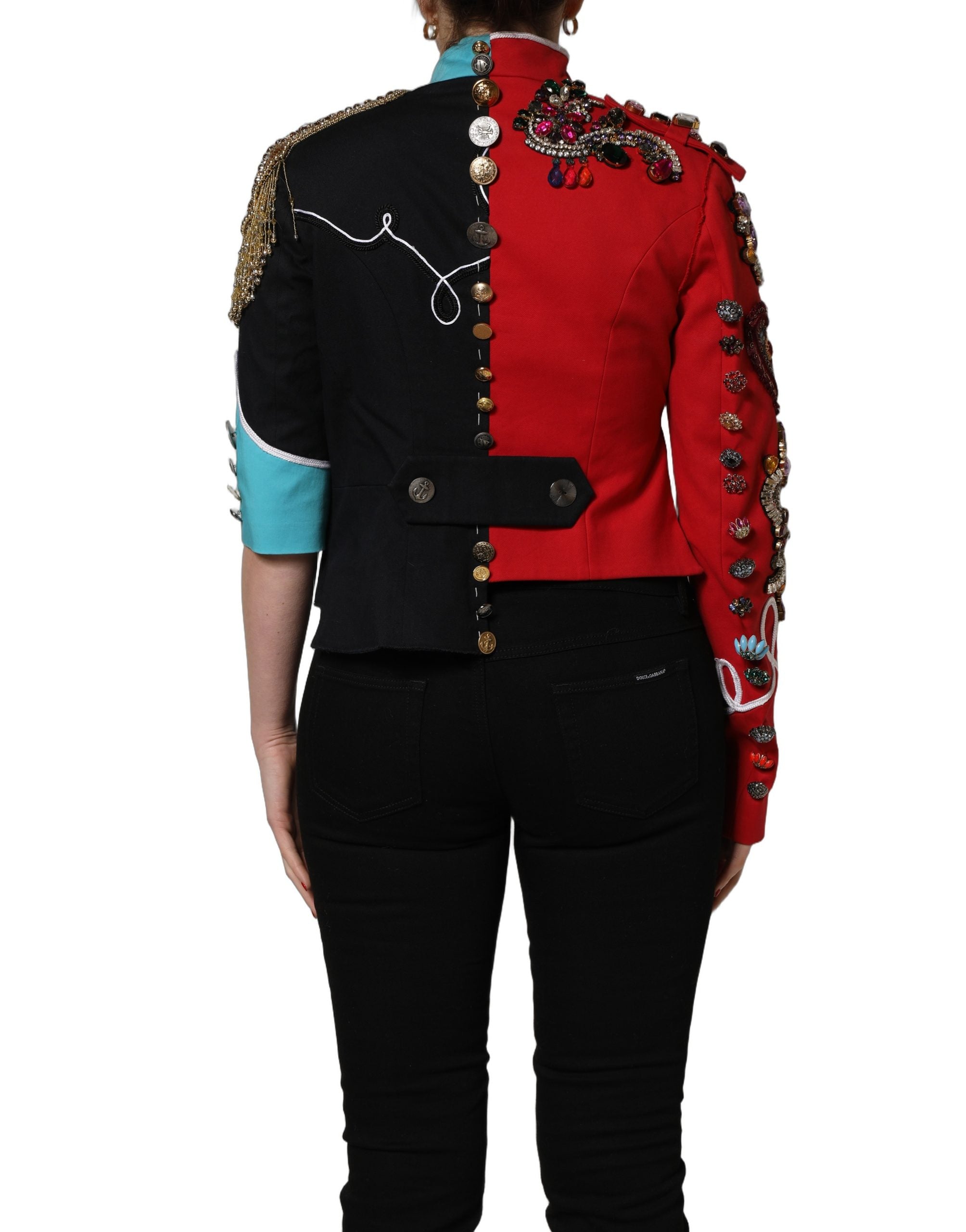 Discover the Dolce & Gabbana Multicolor Asymmetrical Ornate Jewel Cropped Jacket, a stunning blend of Italian craftsmanship and luxurious materials, perfect for the discerning fashion connoisseur.