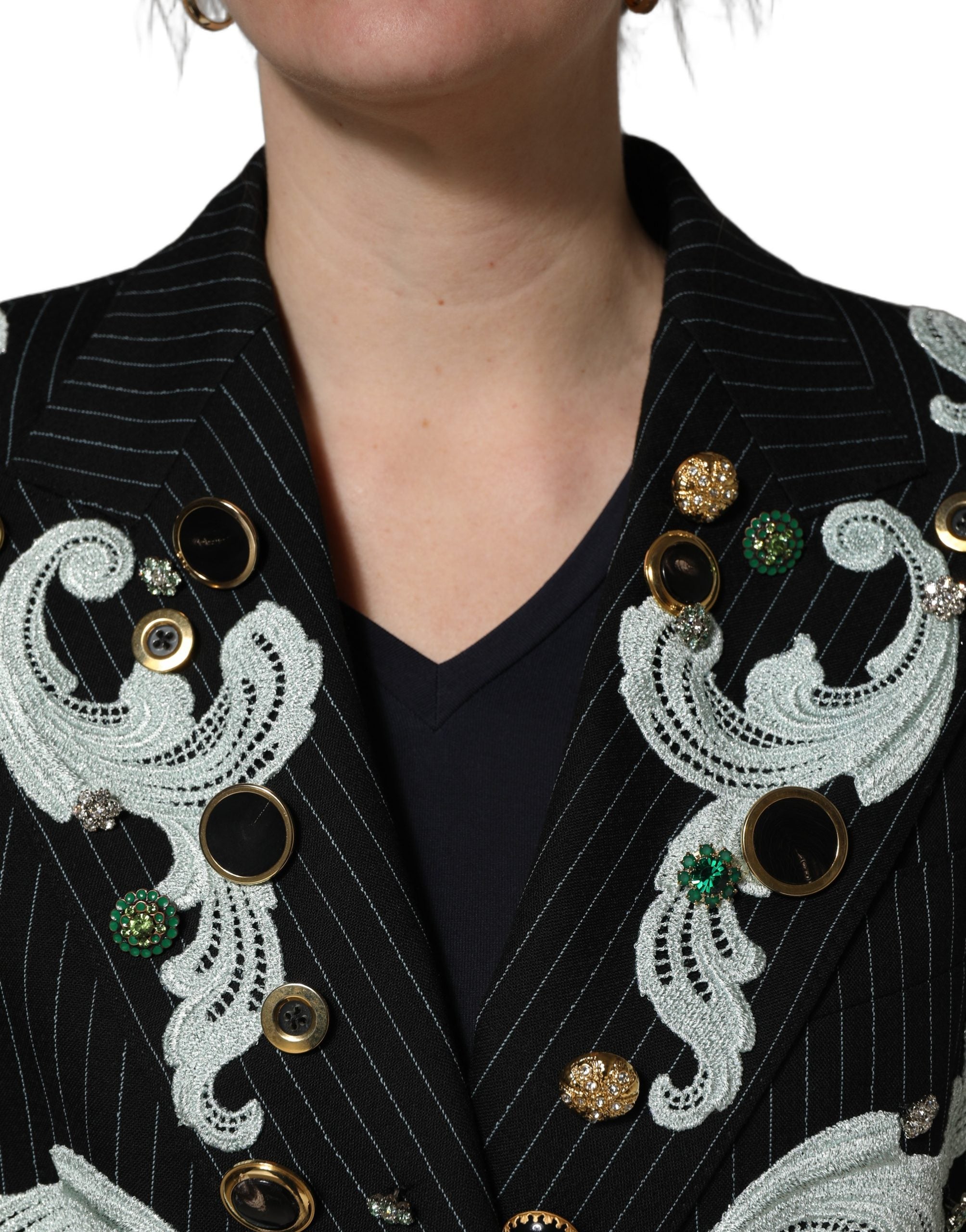Elevate your wardrobe with the Dolce & Gabbana Black Stripe Double-Breasted Blazer, a luxurious blend of virgin wool and exquisite embroidery, embodying timeless elegance.
