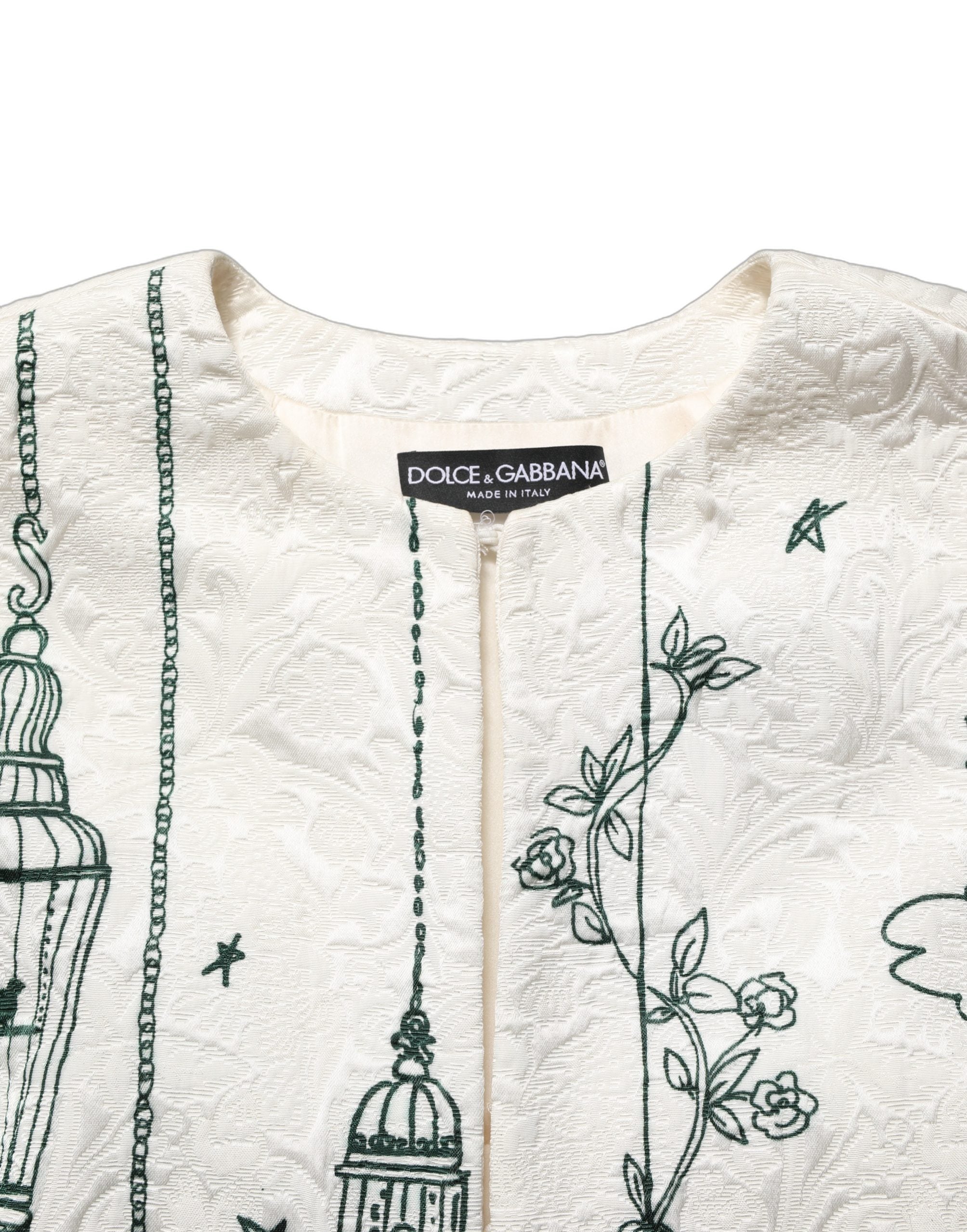 Discover the exquisite Dolce & Gabbana White Jacquard Garden Print Coat, a masterpiece of Italian craftsmanship that embodies luxury and elegance for any occasion.