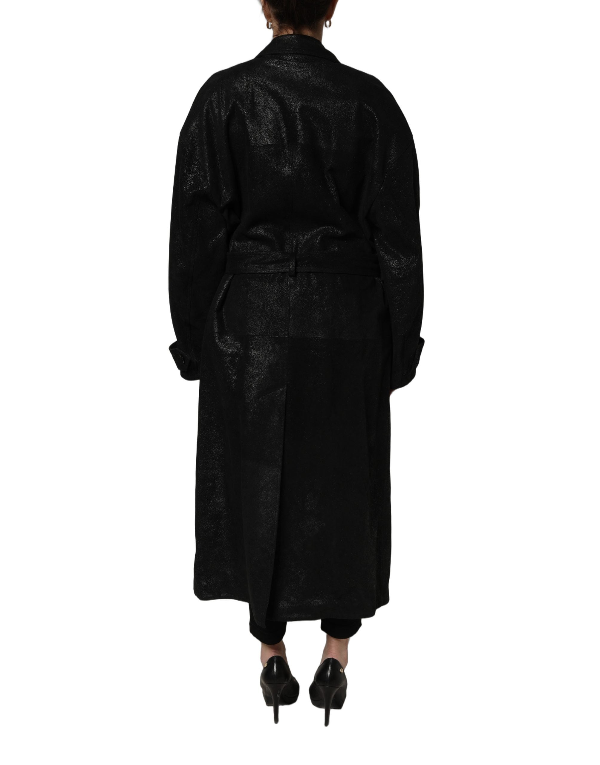 Elevate your style with the Dolce & Gabbana Black Belted Sheepskin Trench Coat, a masterpiece of Italian craftsmanship that embodies timeless sophistication and luxury.