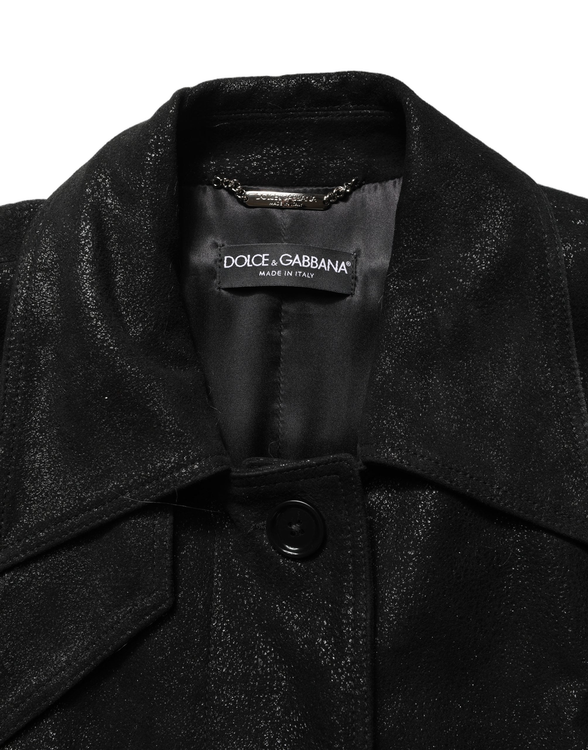 Experience the allure of the Dolce & Gabbana Black Belted Sheepskin Trench Coat, a masterpiece of Italian craftsmanship that embodies timeless sophistication and luxury.