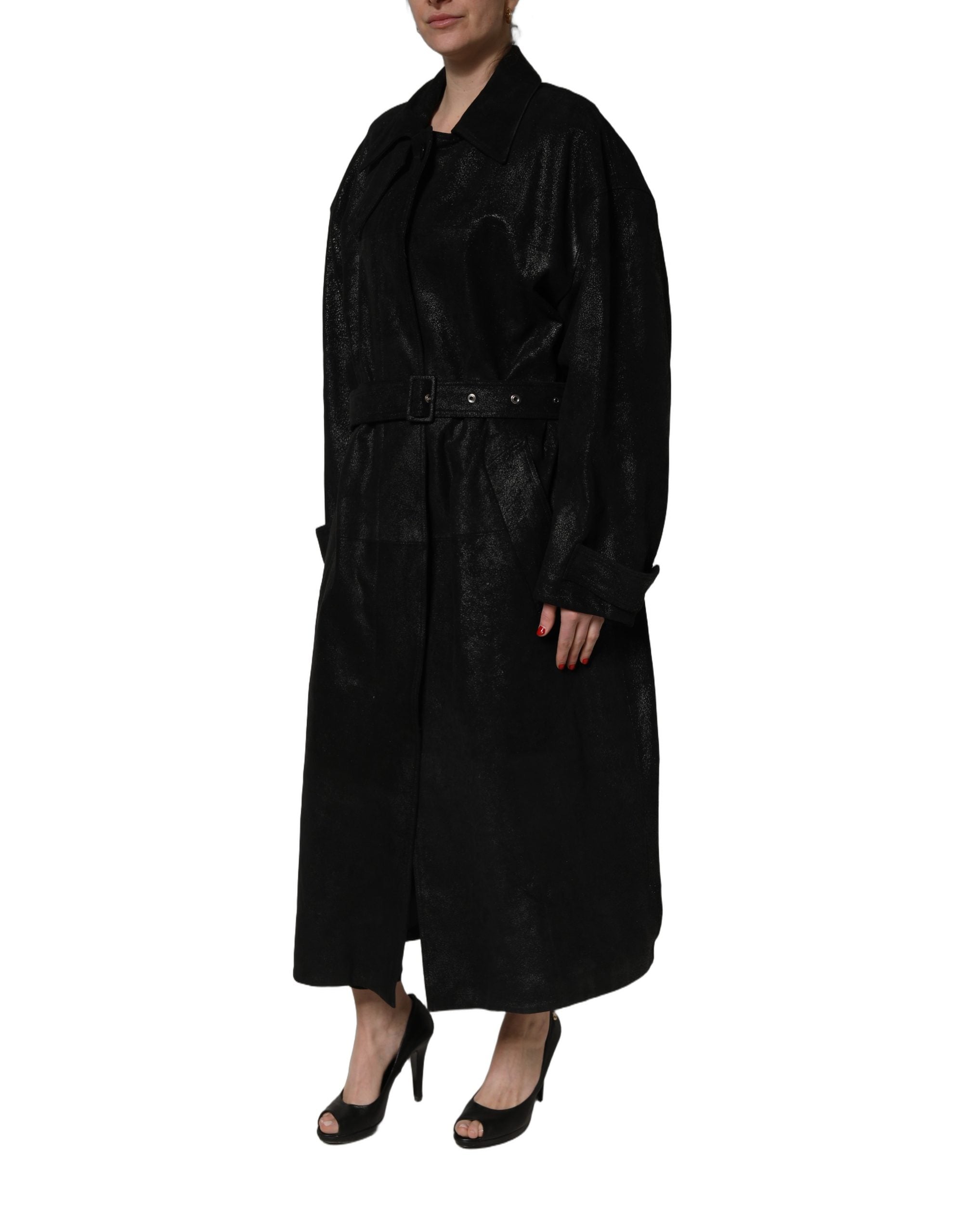 Elevate your wardrobe with the Dolce & Gabbana Black Belted Sheepskin Trench Coat, a timeless masterpiece of Italian craftsmanship that embodies luxury and sophistication.