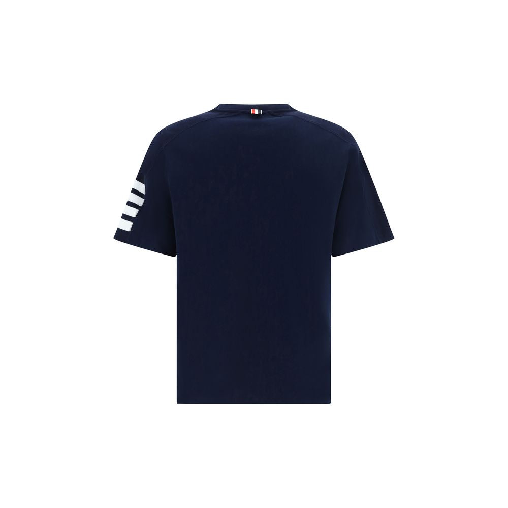 Elevate your wardrobe with the Thom Browne Blue Cotton T-Shirt, a luxurious blend of comfort and sophistication, perfect for those who embrace refined elegance.